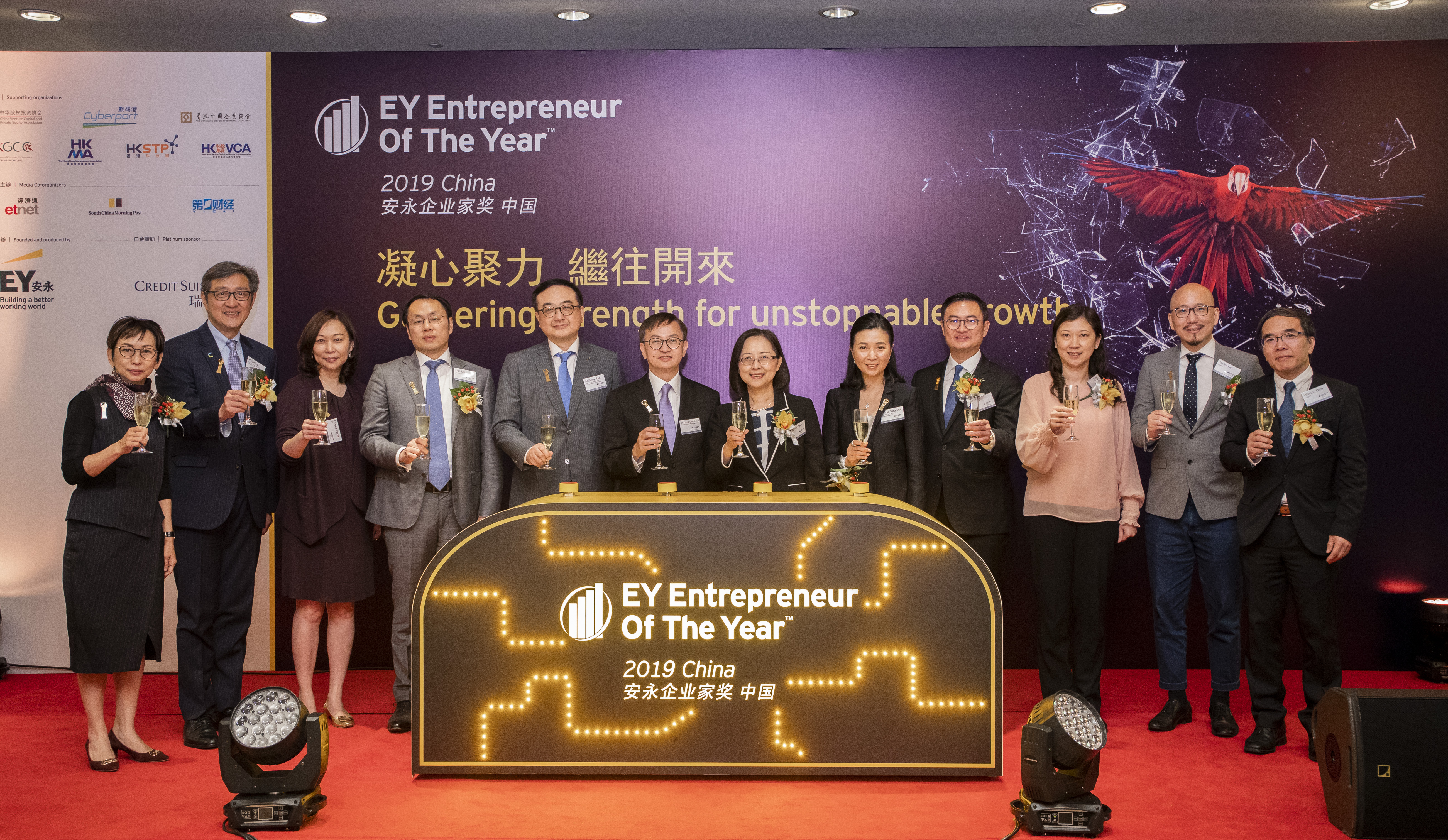 At the launch ceremony of the EOY China Programme in Hong Kong, top executives and key facilitators of the programme join hands with representatives from various supporting organisations and partners.