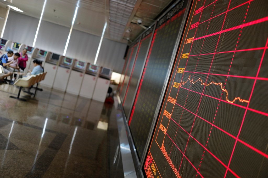  An electronic stock board at a securities brokerage house in Beijing. Photo: EPA/EFE