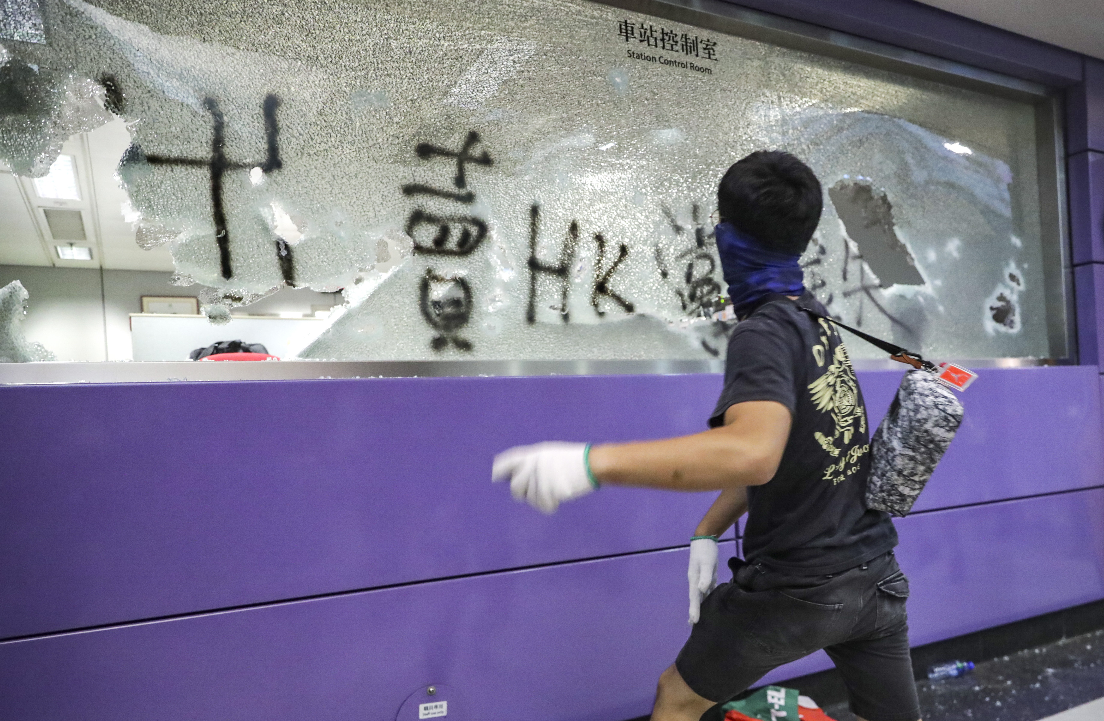 Protesters vandalised Tung Chung MTR station on Sunday after retreating from the Hong Kong International Airport. Photo:  Edmond So