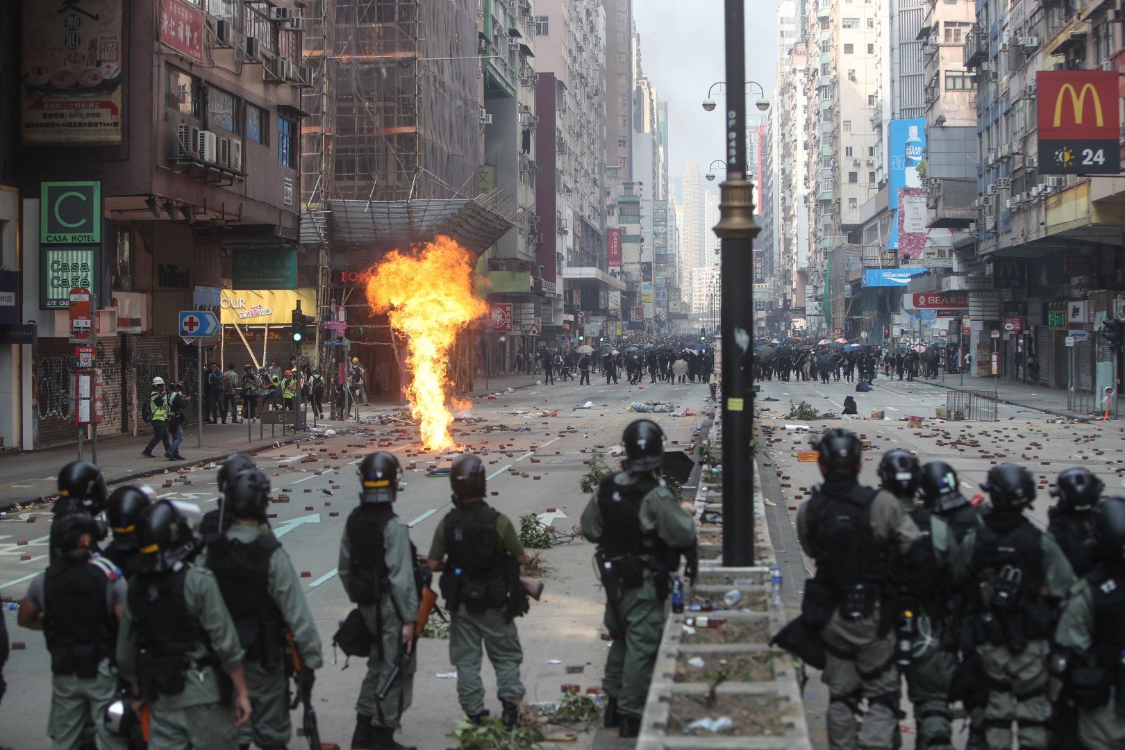 Protesters and riot police battling Monday on the streets of Hong Kong. Photo: Winson Wong 