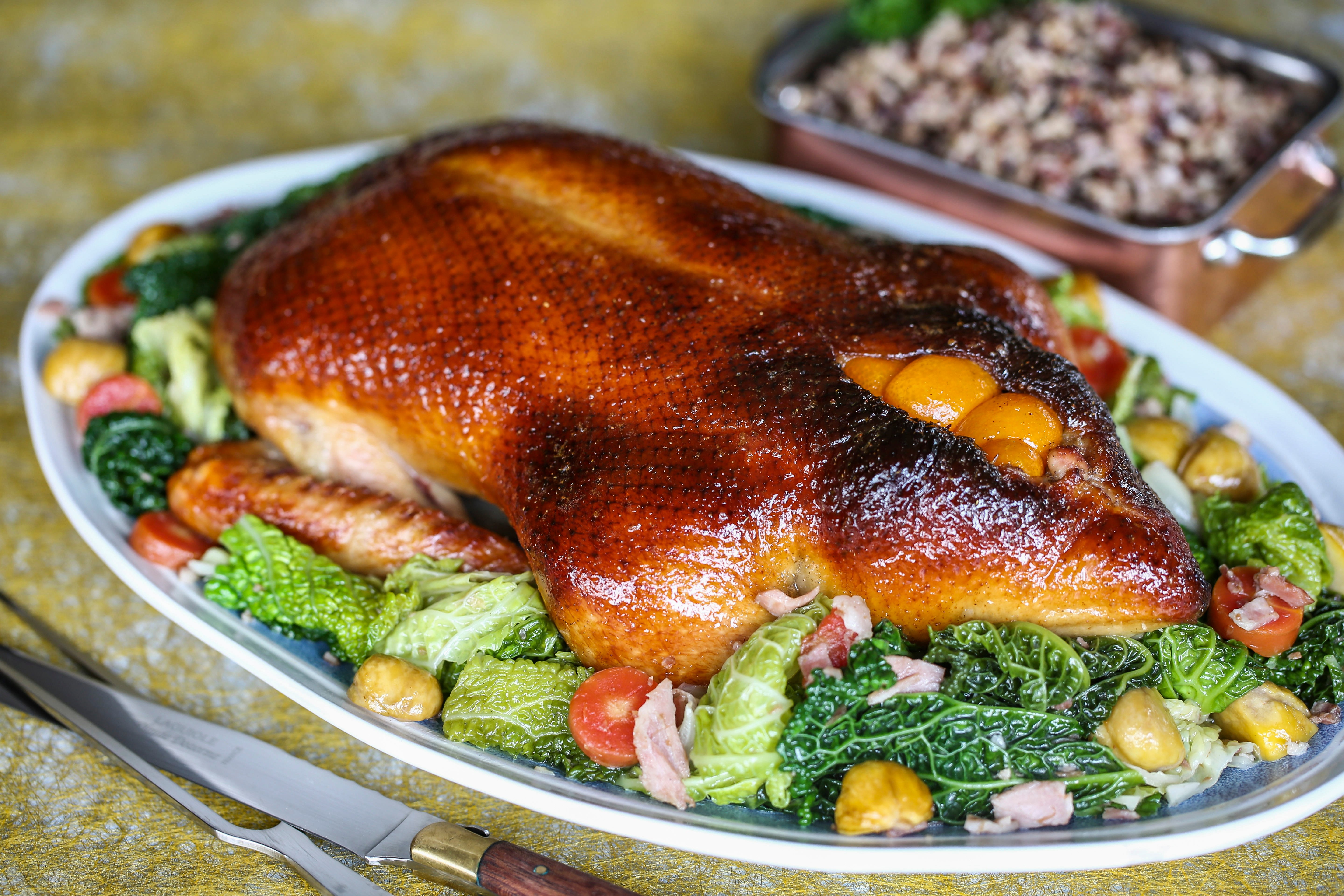 Glazed duck with kumquats