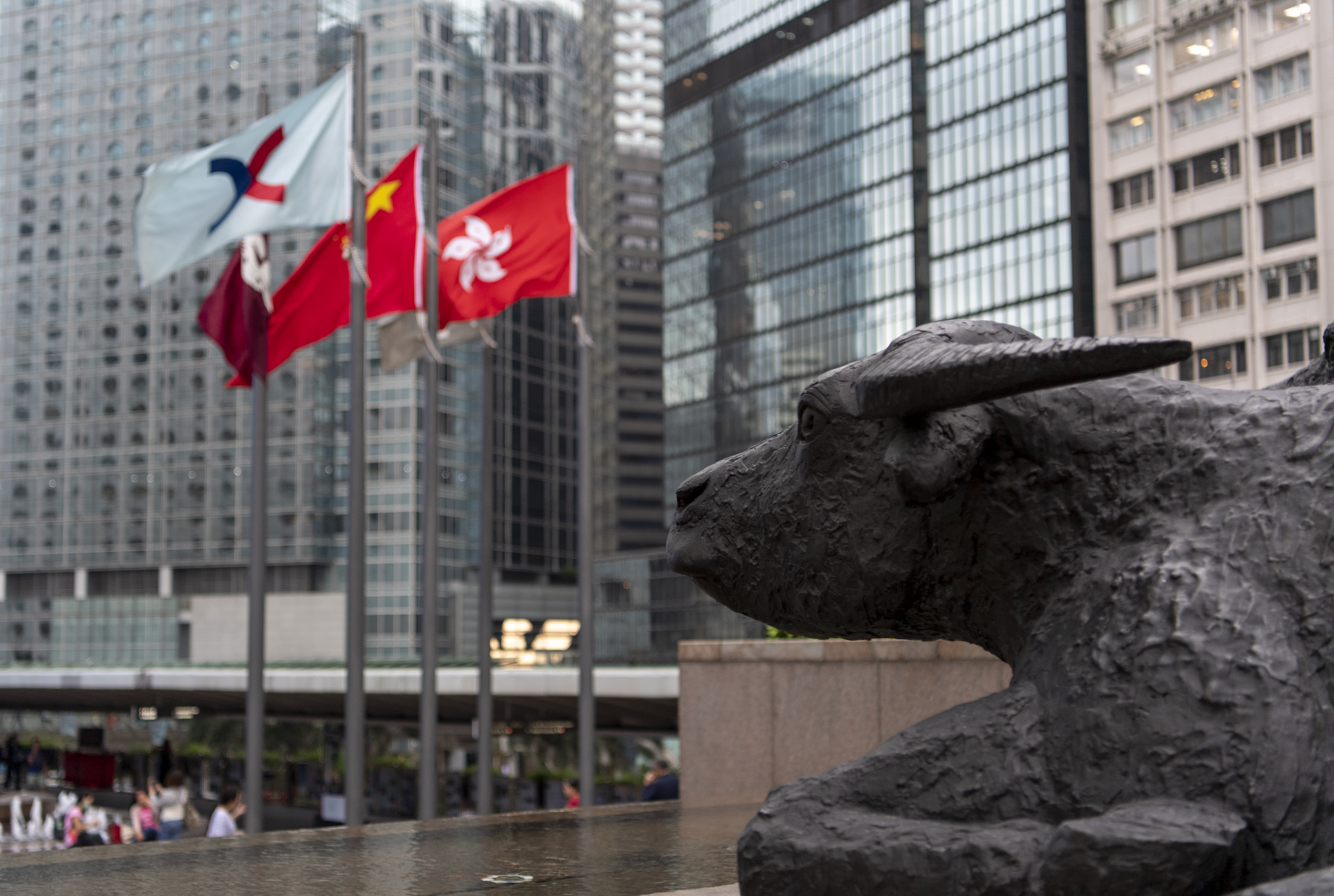 Bronze sculptures of bulls, the symbol of the Hong Kong stock exchange, at the Exchange Square in Central. Photo: Warton Li
