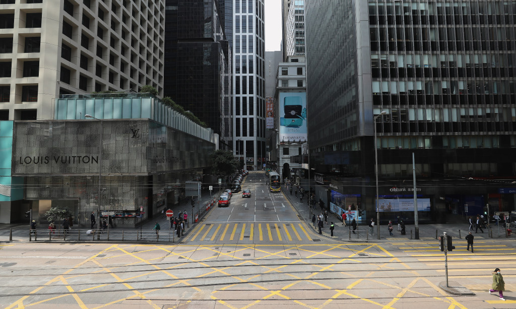 Even in Hong Kong’s central business district, few people are seen on the streets as lunch hour approaches because of the coronavirus epidemic. (Picture: SCMP)