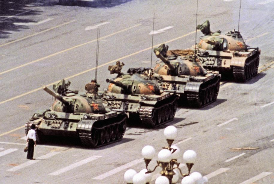 On June 5, 1989, a lone man confronts a column of Chinese tanks on Chang Ahn Boulevard just a day after a military crackdown which left scores of dead.symbol for democracy and freedom of rights. Photo: AP