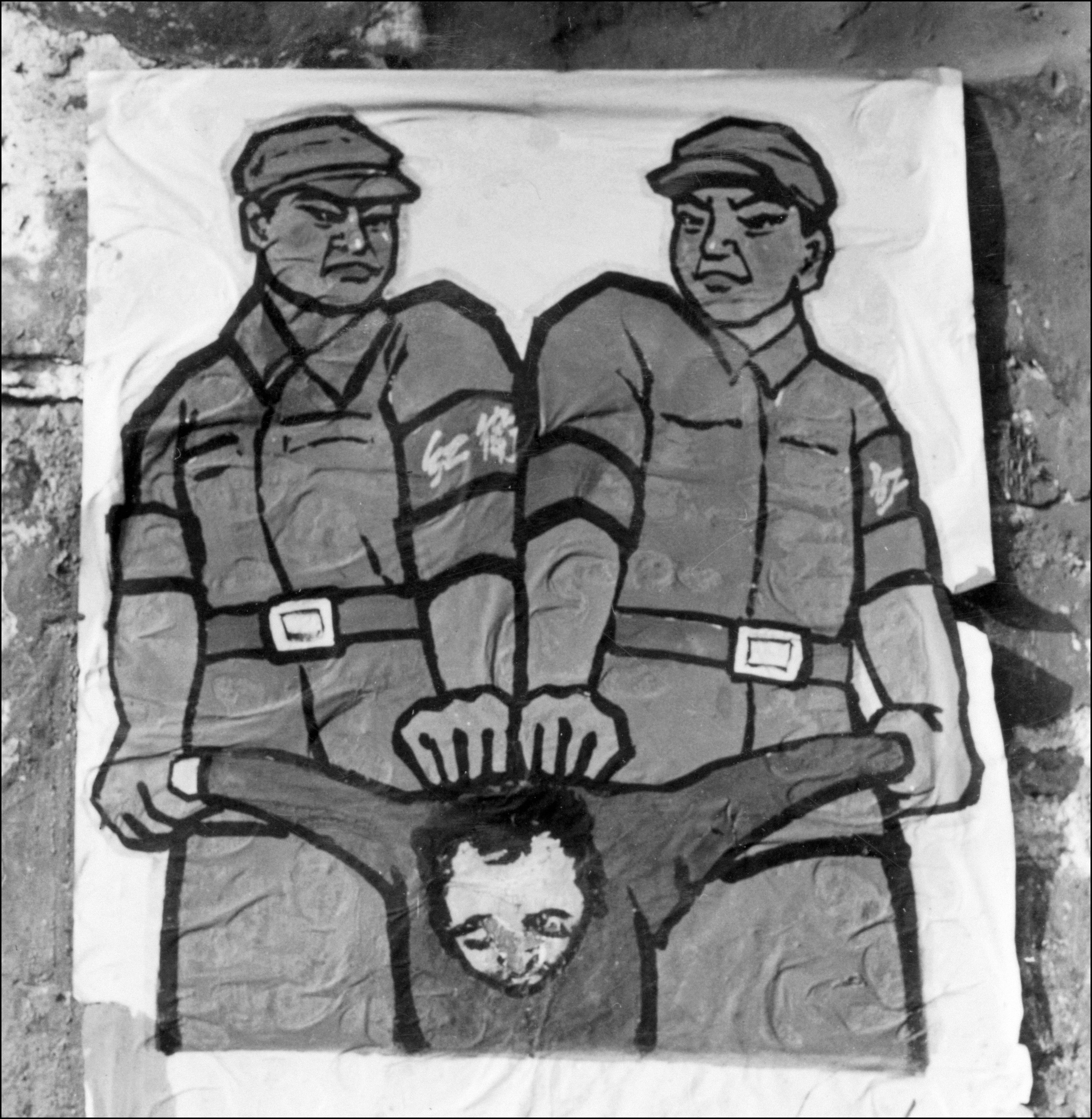A poster on the street of Beijing in 1966 shows how the proletarian Red Guards should deal with the “enemy of the people,” which included landlords, rich farmers and those who favor&nbsp;capitalism.