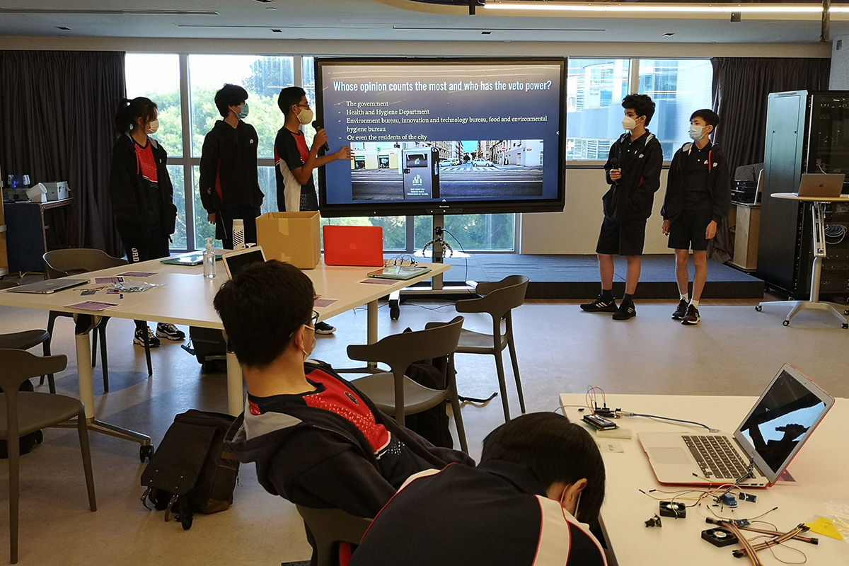 Grade 9 and 10 students worked with professionals from MIT Innovation Node to design a product, then practiced their pitches on classmates.