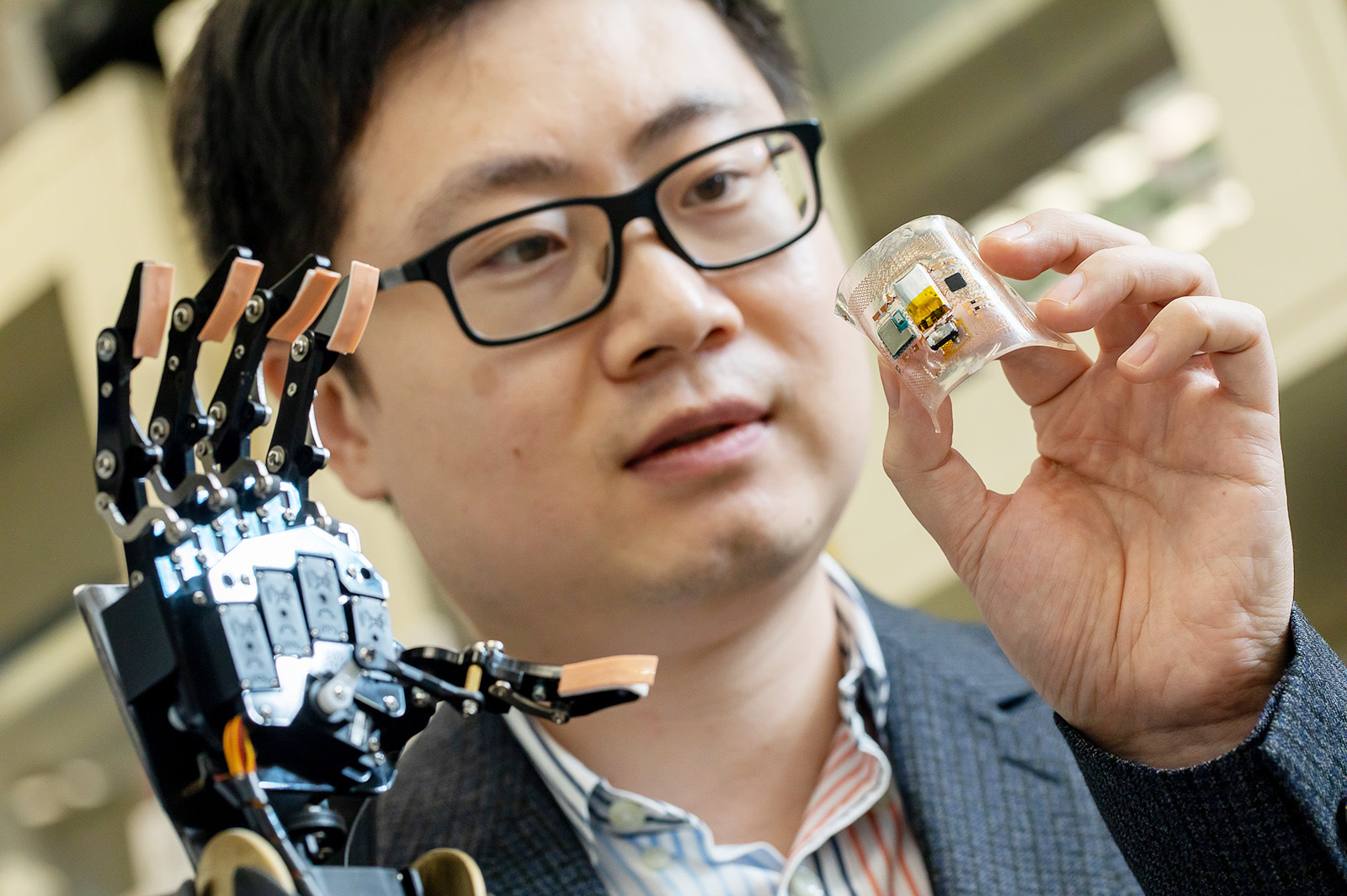 The flexible, multi-layered electronic skin developed by Dr Yu Xinge and his team is the cornerstone of the new Robotic VR system. The sensors on the robotic hands provide haptic feedback to the user.