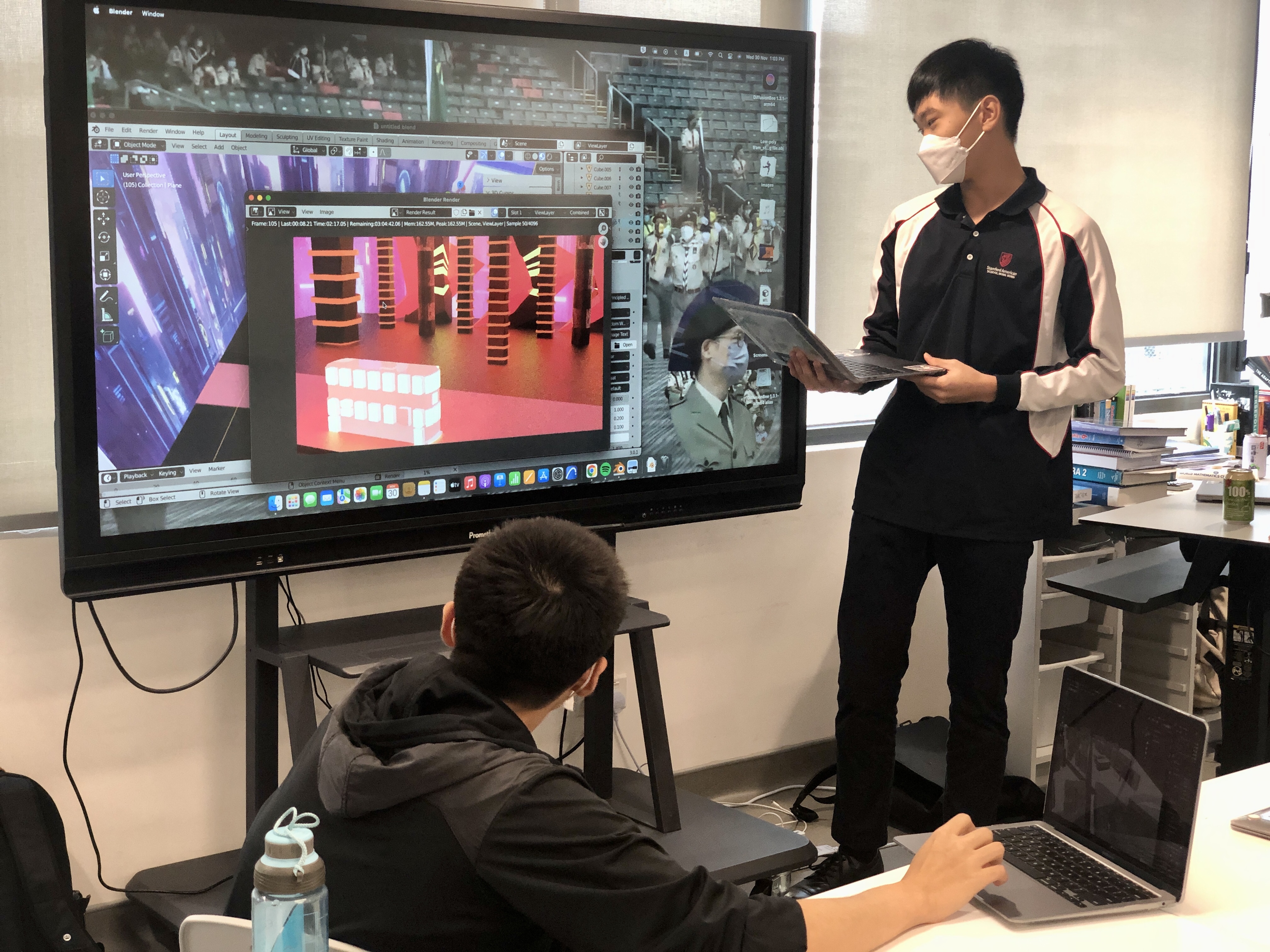 Grade 10 student presenting the final Cornerstones project, a 3D animation tram render in a cityscape.