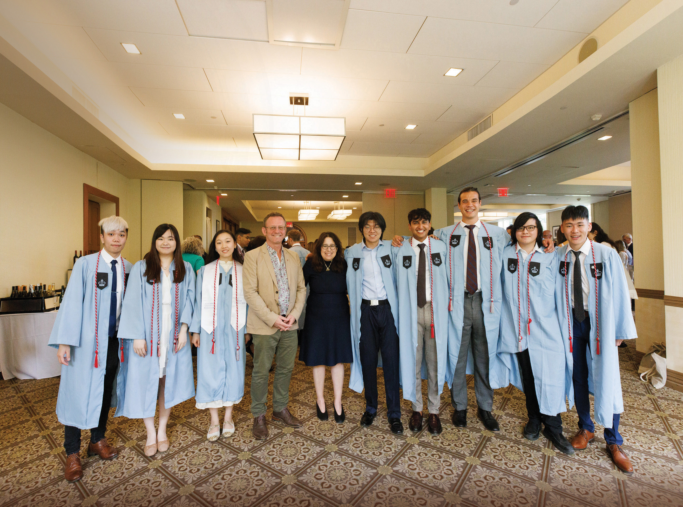 Prof Richard M Walker, Dean of CLASS (fourth from left), greeted the Joint Bachelor’s Degree Program graduates after the Class Day ceremony.