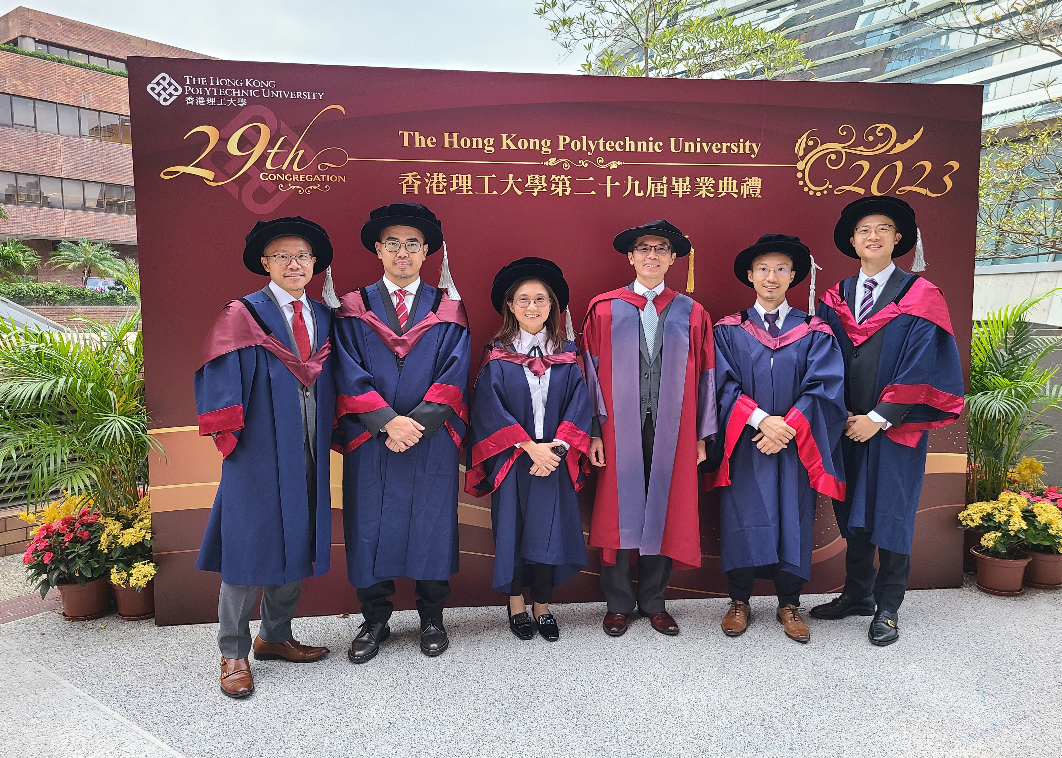 Dr Daniel Chan (third from right), Programme Leader of the Doctor of International Real Estate and Construction programme at PolyU with the first batch of DIREC graduates. 