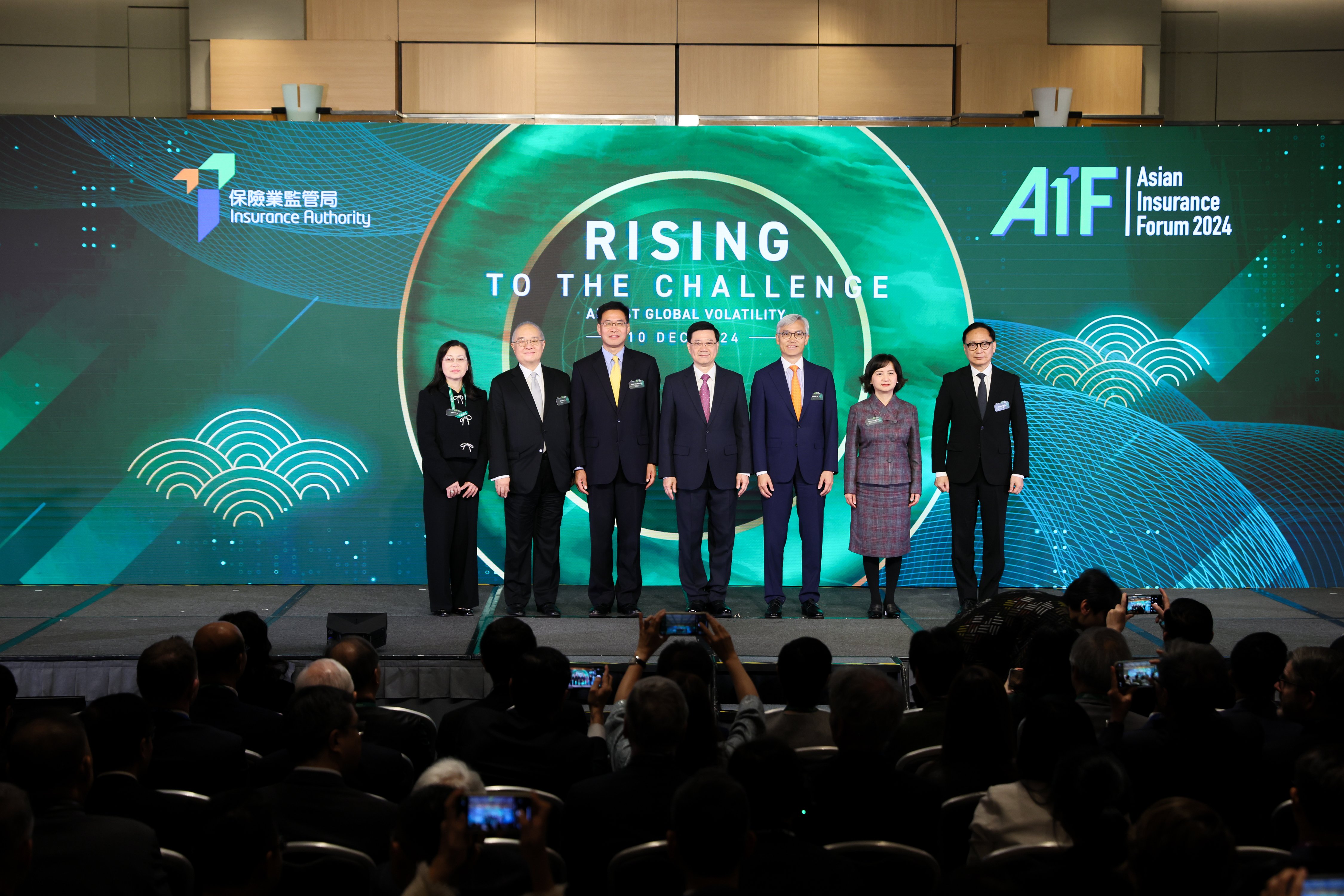 Officiating guests at the AIF 2024 opening ceremony (from right): Mr Clement Cheung, Chief Executive Officer of the IA; Ms Luo Yanjun, Director General of the Personal Insurance Supervision Department of the National Financial Regulatory Administration; Mr Stephen Yiu, Chairman of the IA; Mr John Lee, Chief Executive of the HKSAR; Mr Qi Bin, Deputy Director of the Liaison Office of the Central People's Government in the HKSAR; Dr Moses Cheng, Founding Chairman of the IA; and Professor Anna Wong, Non-Executive Director of the IA.