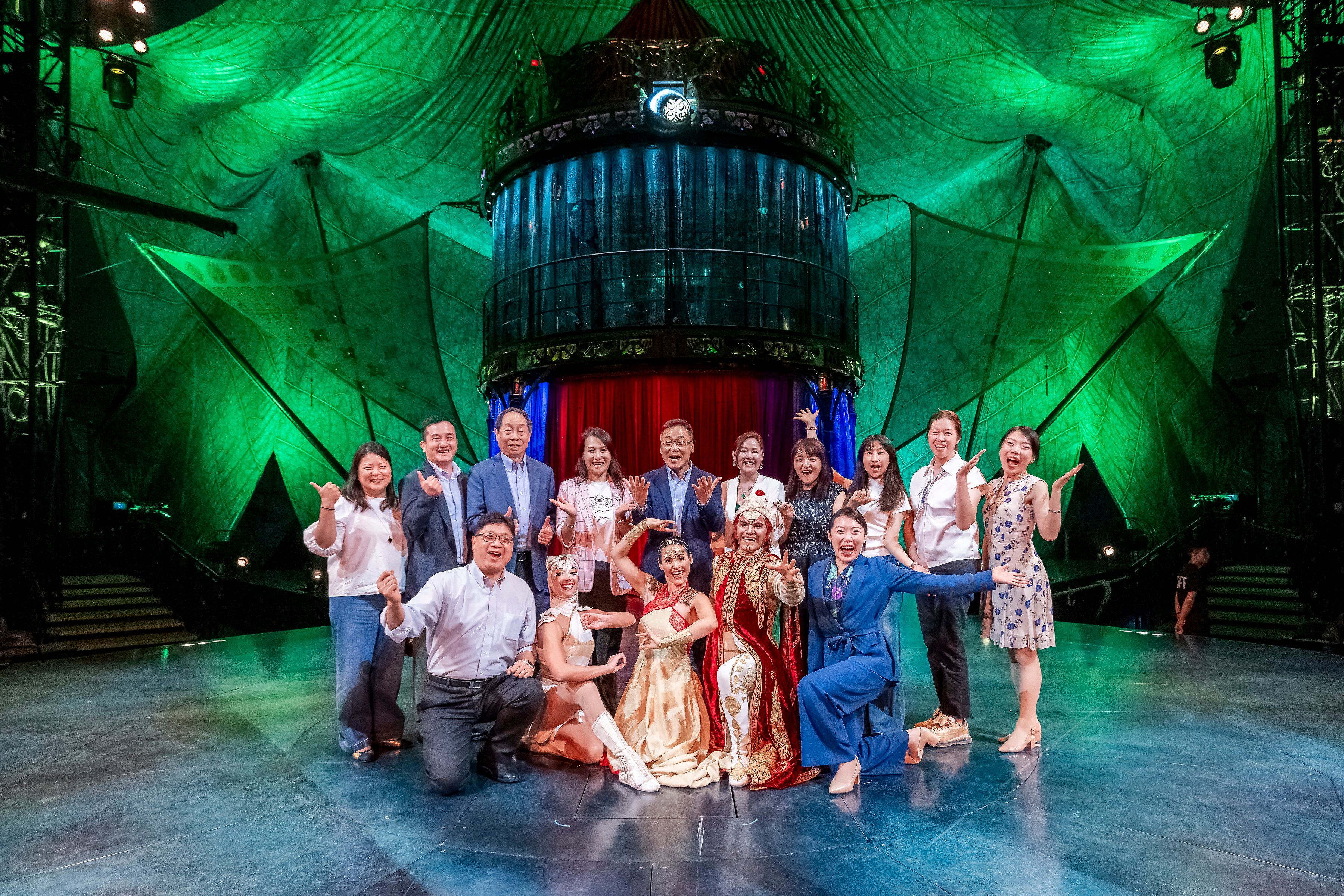 Spreading smiles in Hong Kong: (back row, fifth from left) Mr Vincent Lam, founder of the Lam Kwun King Memorial Fund, with representatives from NGOs and performers of Cirque du Soleil KOOZA.