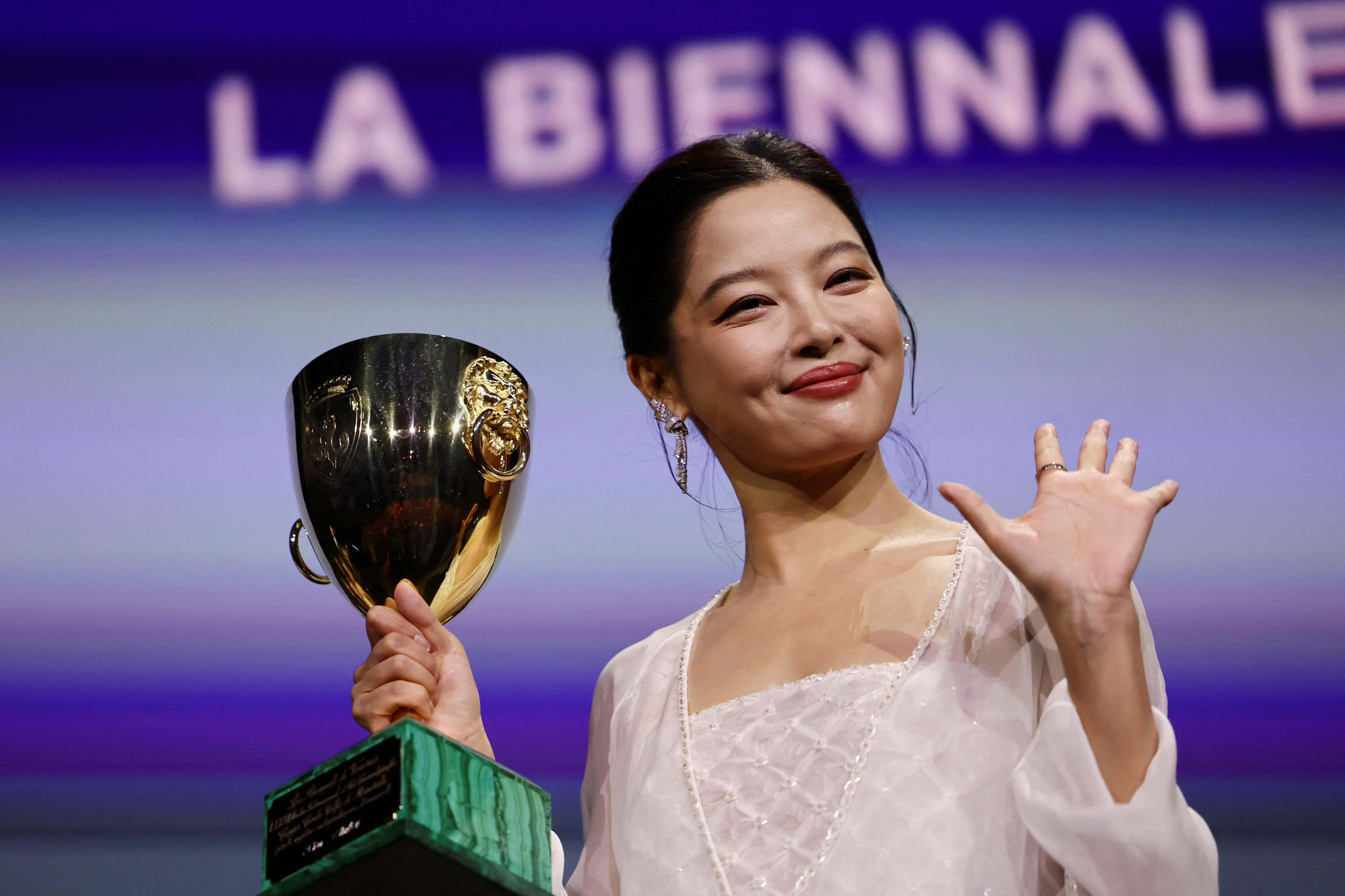 Xin Zhilei wins best actress at Venice Film Festival