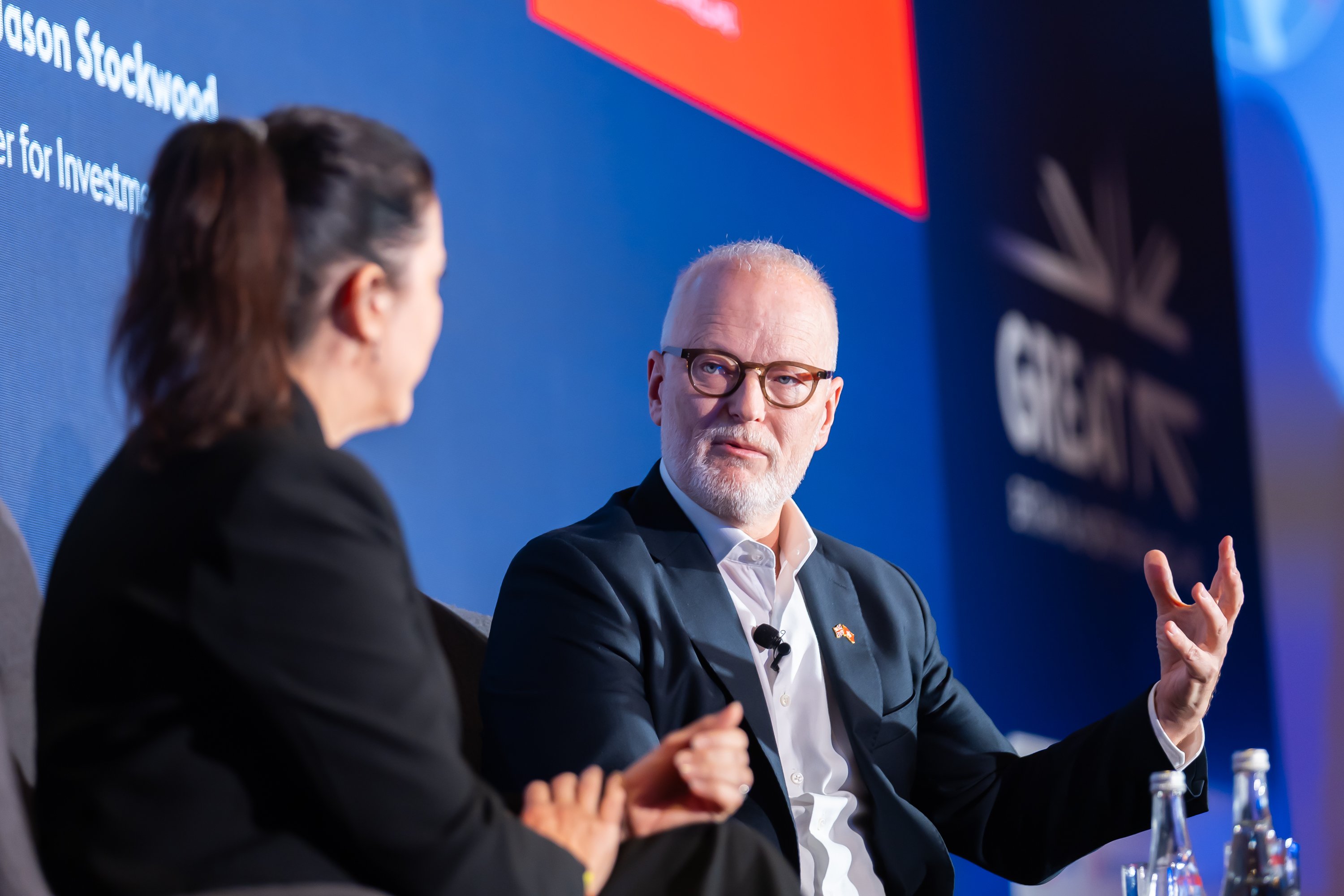 Lord Jason Stockwood, Minister for Investment, in conversation with Rachel Huf, CEO, Hong Kong, Barclays, at the UK Investment Conference 2025 in Hong Kong.