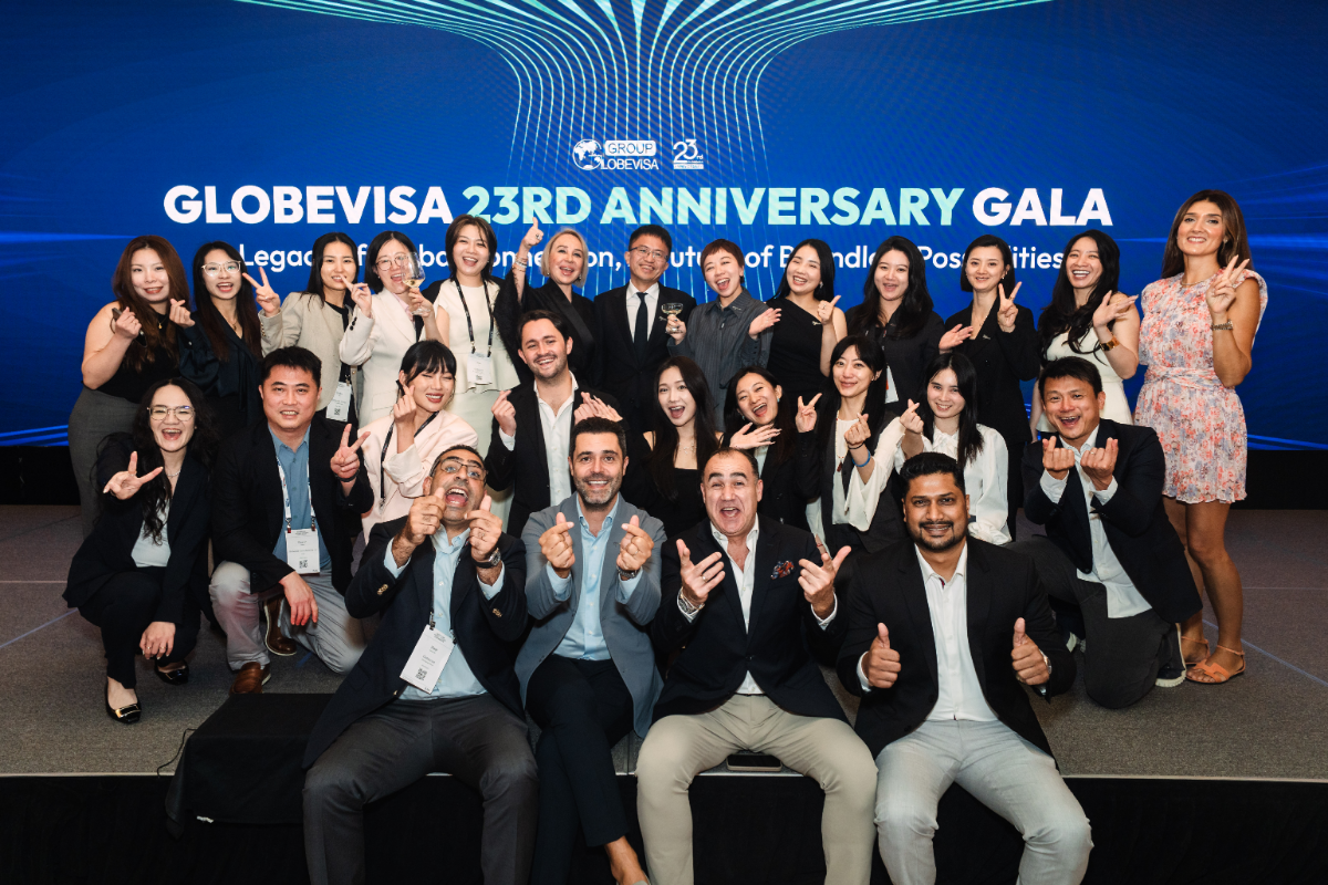 Globevisa CEO Henry Fan, joined by key team members and partners, celebrating the group's 23rd anniversary at the 2025 GGCC. Source: Globevisa Group