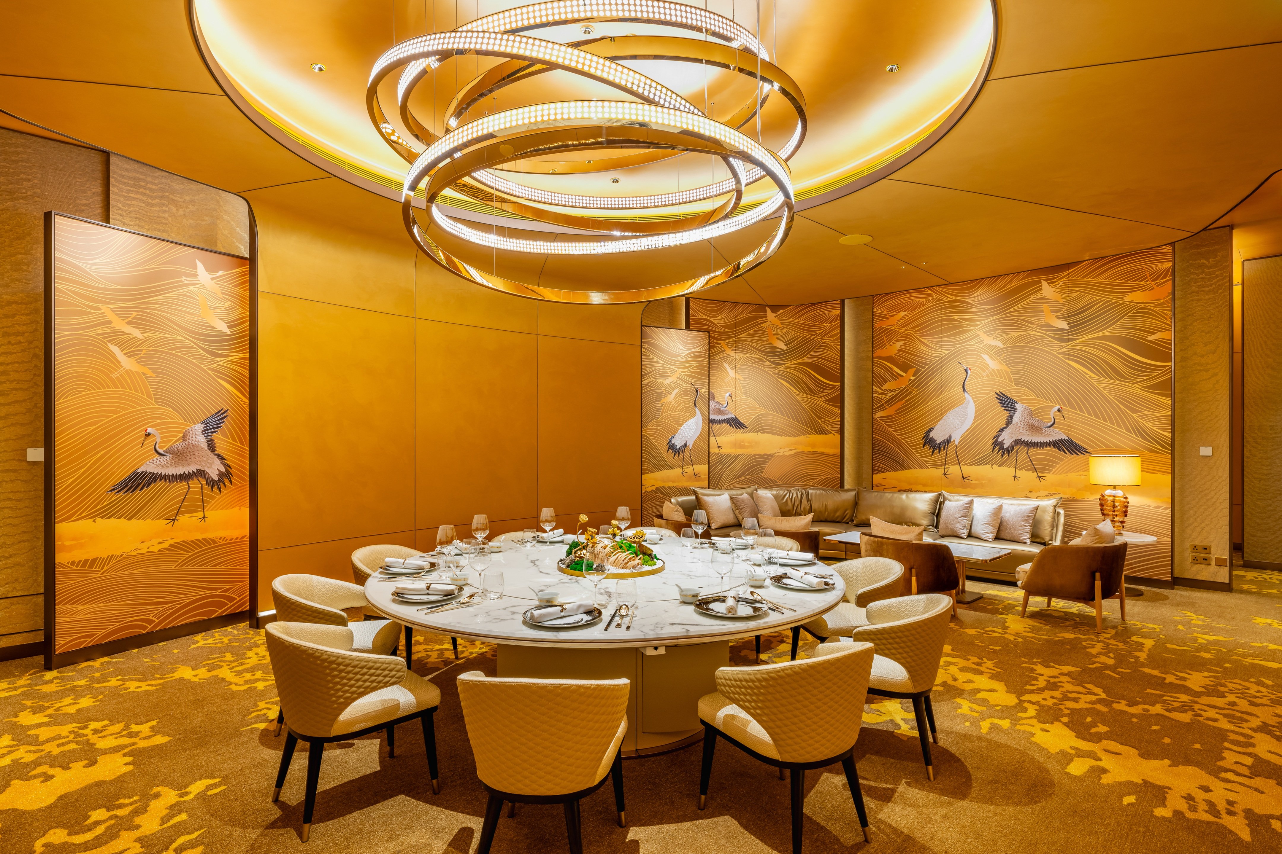 A gold-themed private dining room at Enchanté draws on traditional Chinese colours, auspicious motifs and craftsmanship.