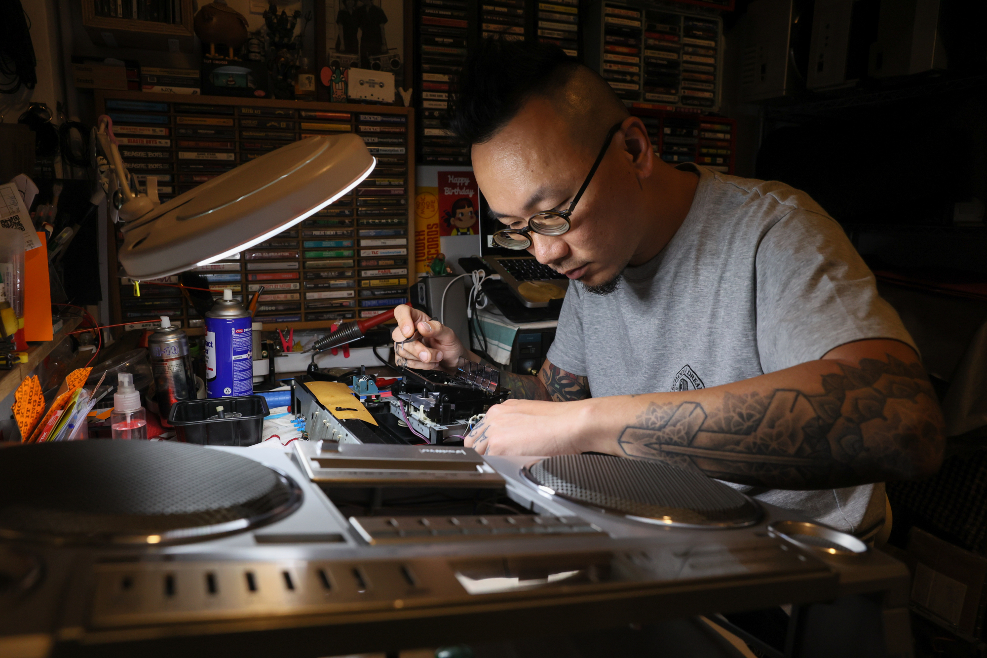 Chow repairs old audio players. Photo: Dickson Lee