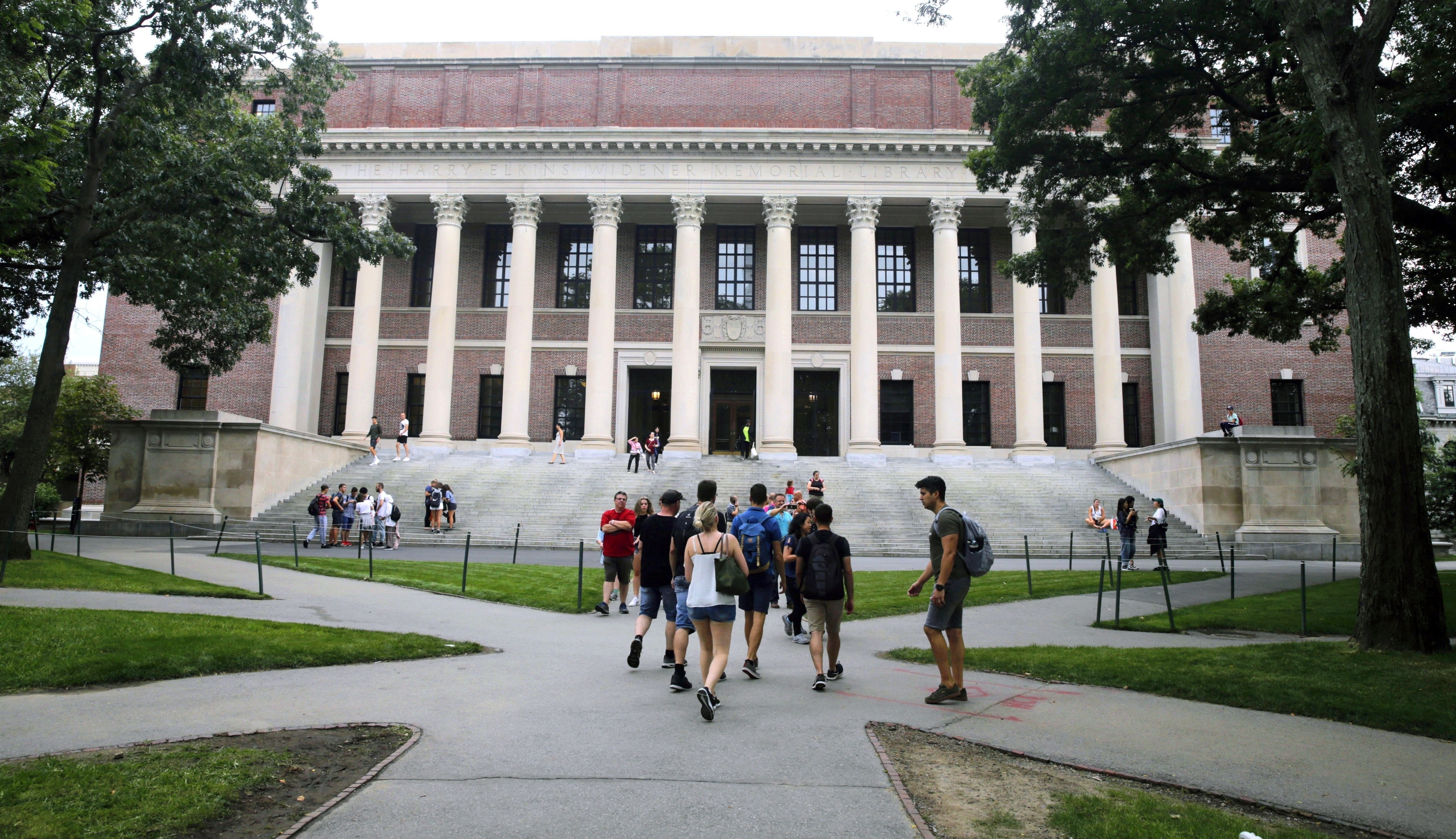 Students walk near the Widener Library at Harvard University in Cambridge, Massachusetts on August 13, 2019. A federal appeals court has upheld a district court decision clearing Harvard University of intentional discrimination against Asian-American applicants. Photo: AP
