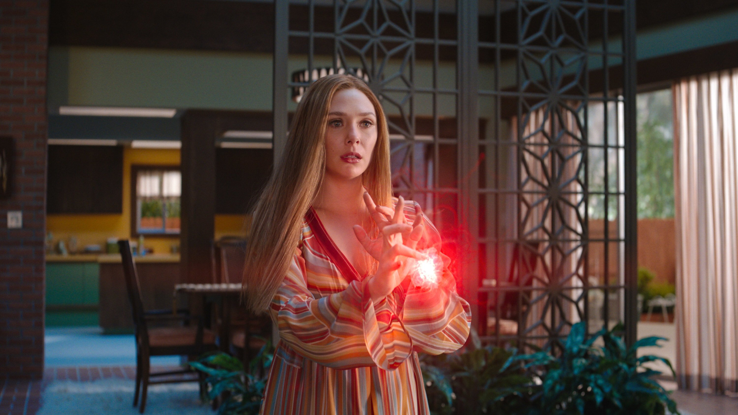 Elizabeth Olsen as Wanda Maximoff in a scene from WandaVision. Marvel Studios chief Kevin Feige says a second season is being considered for the show on Disney+. Photo: Marvel Studios via AP