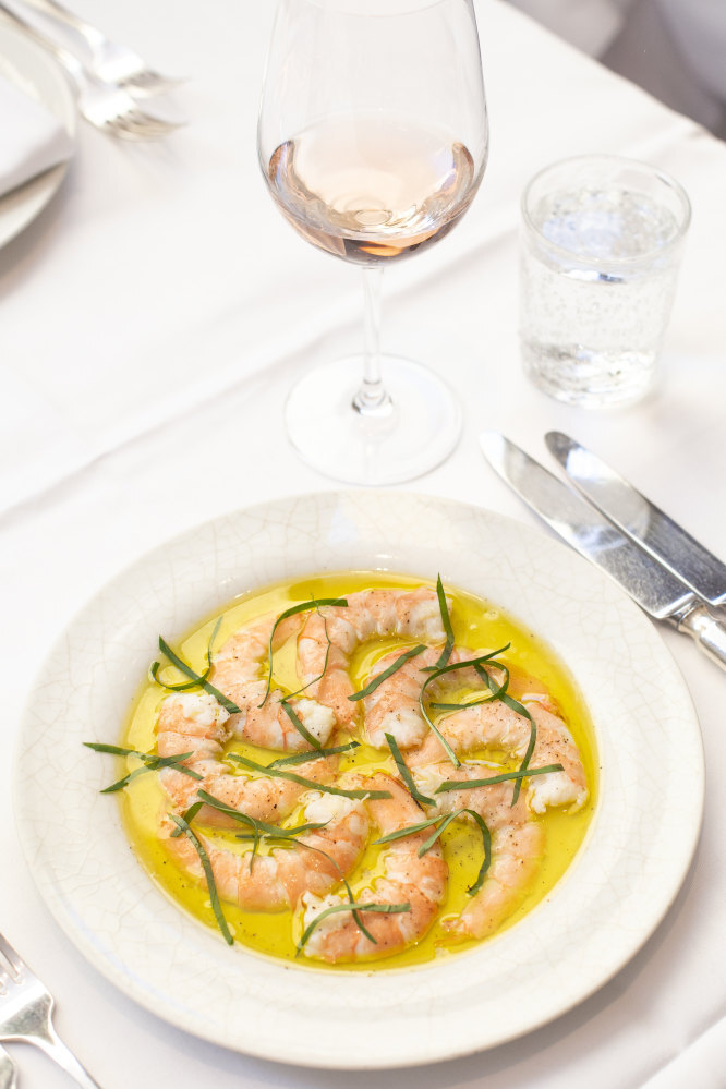 Prawns in olive oil at LPM Restaurant & Bar. Photo: La Petite Maison