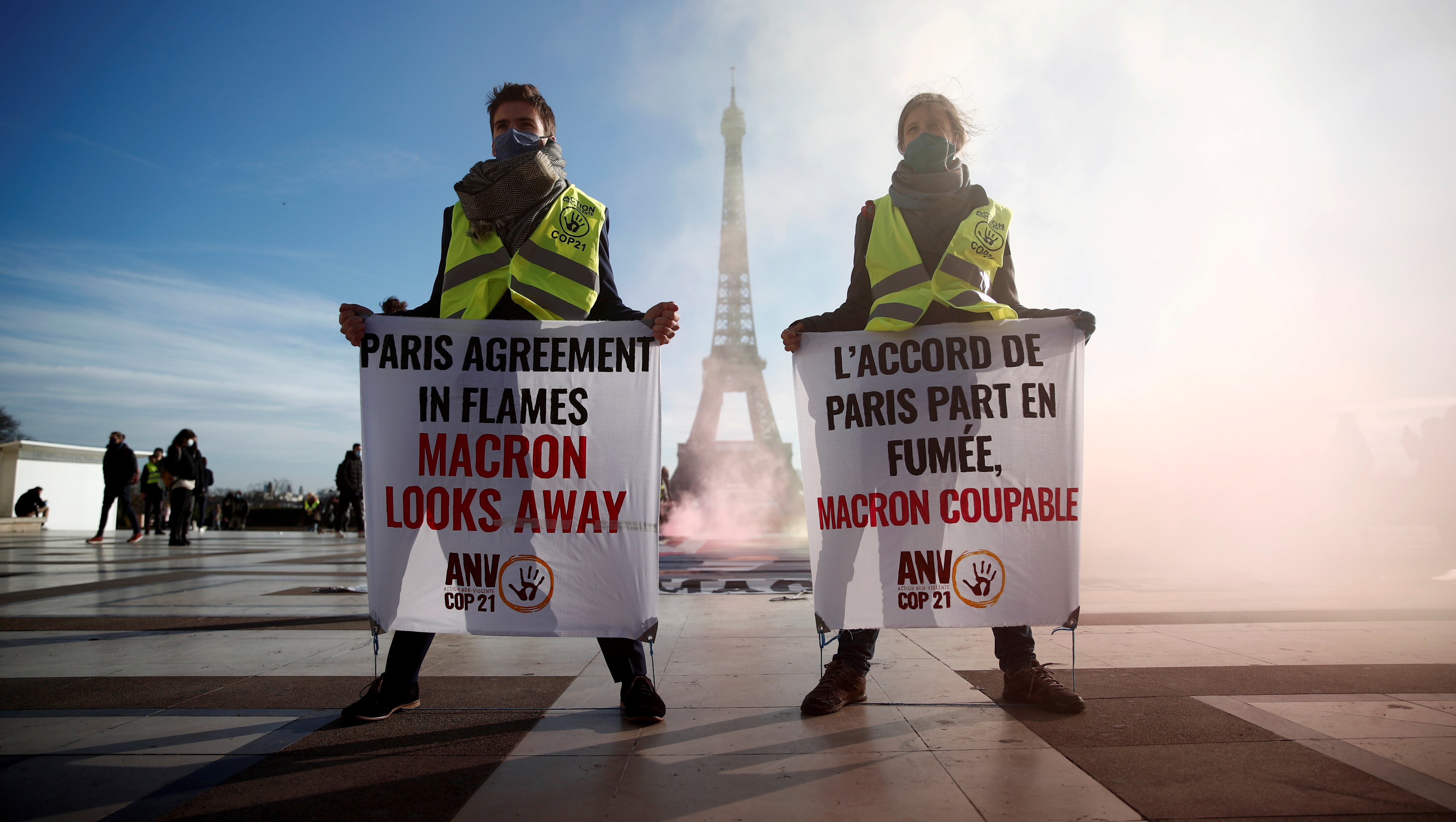 Climate activists demonstrate in front of the Eiffel Tower to mark the fifth anniversary of the 2015 UN Paris agreement on climate change, in Paris on December 10 last year. Slowing global warming is one of the key goals of the 2030 agenda. Photo: Reuters
