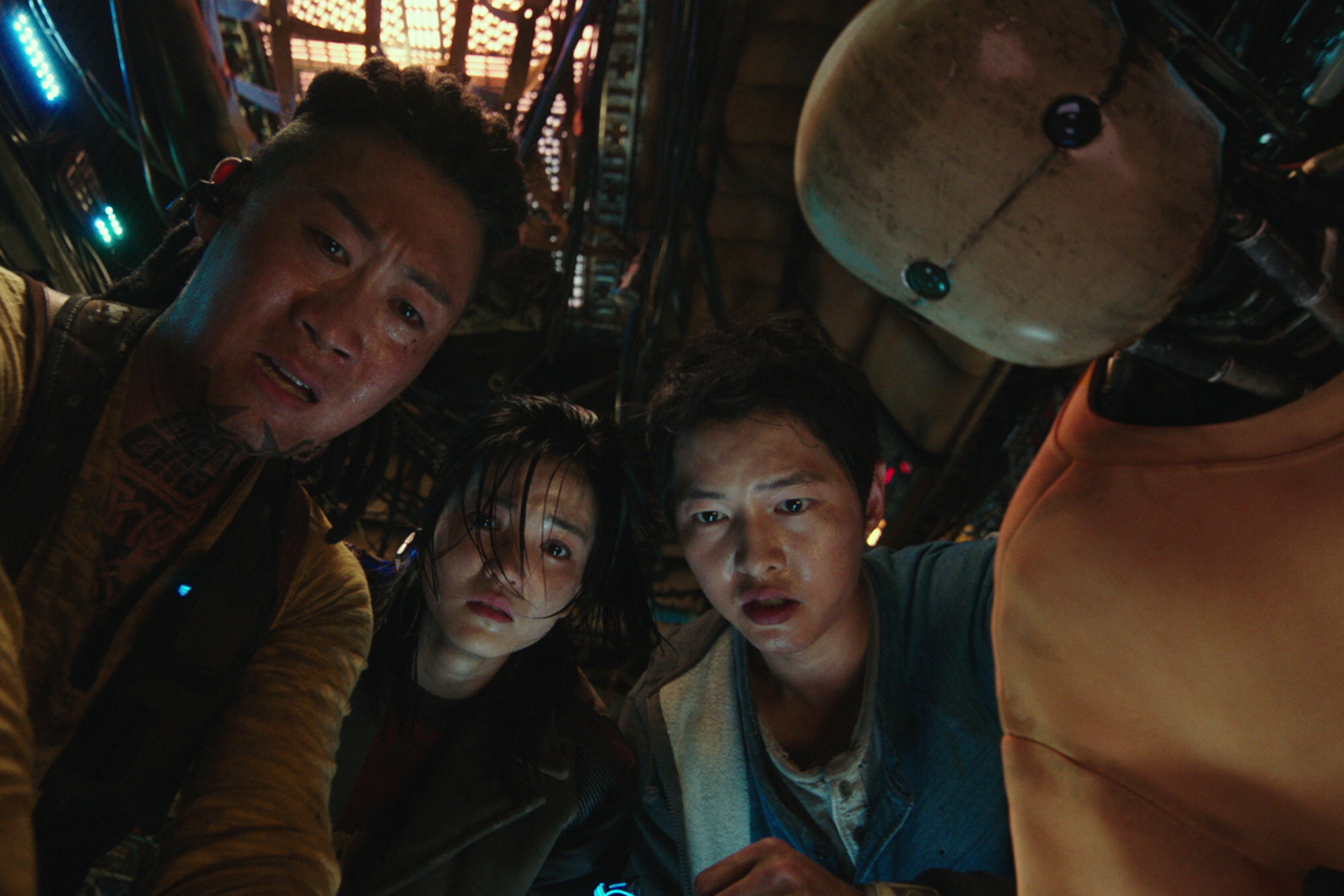 (From left) Jin Seon-kyu, Kim Tae-ri, Song and Yoo Hai-jin in a still from Space Sweepers (2021).