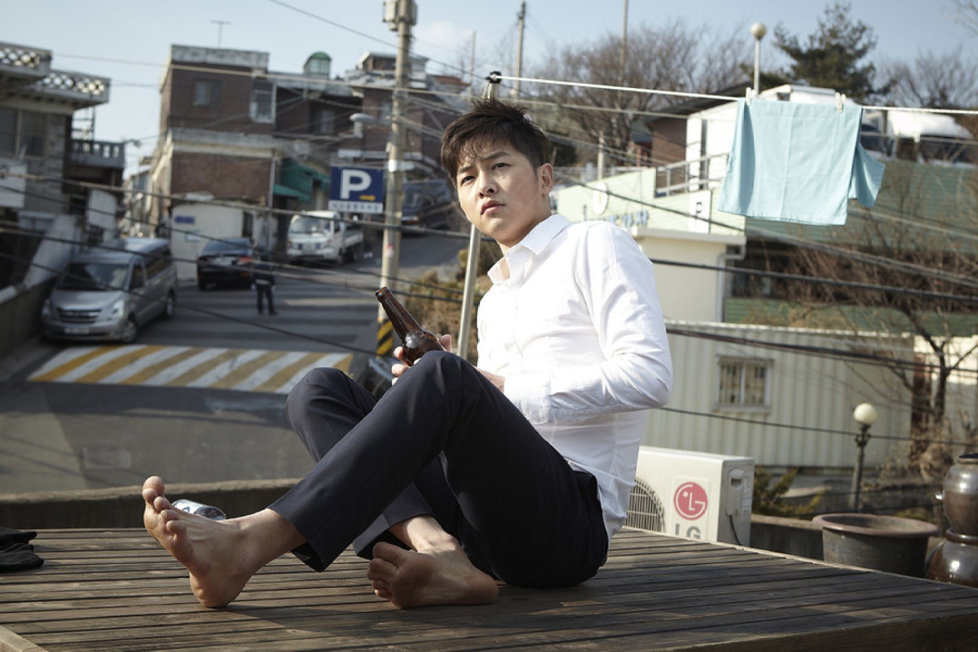 Song Joong-ki in a still from Penny Pinchers (2011).