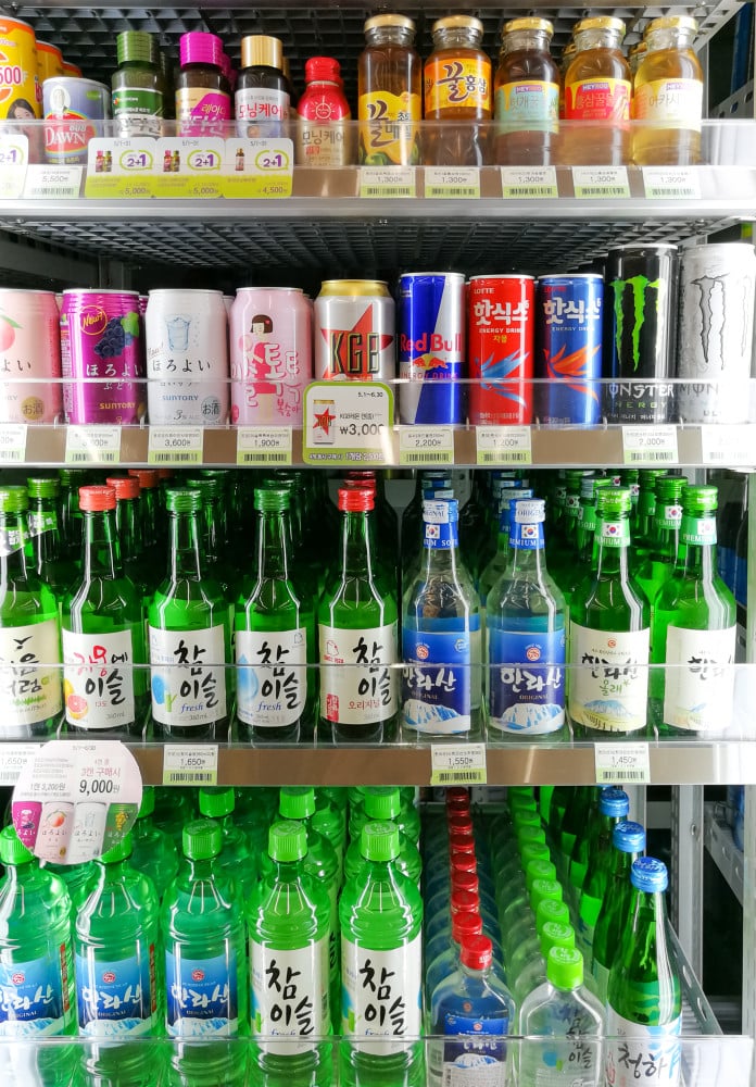 Rows of shelves with a variety of Korean soju and drinks on display. Photo: Shutterstock