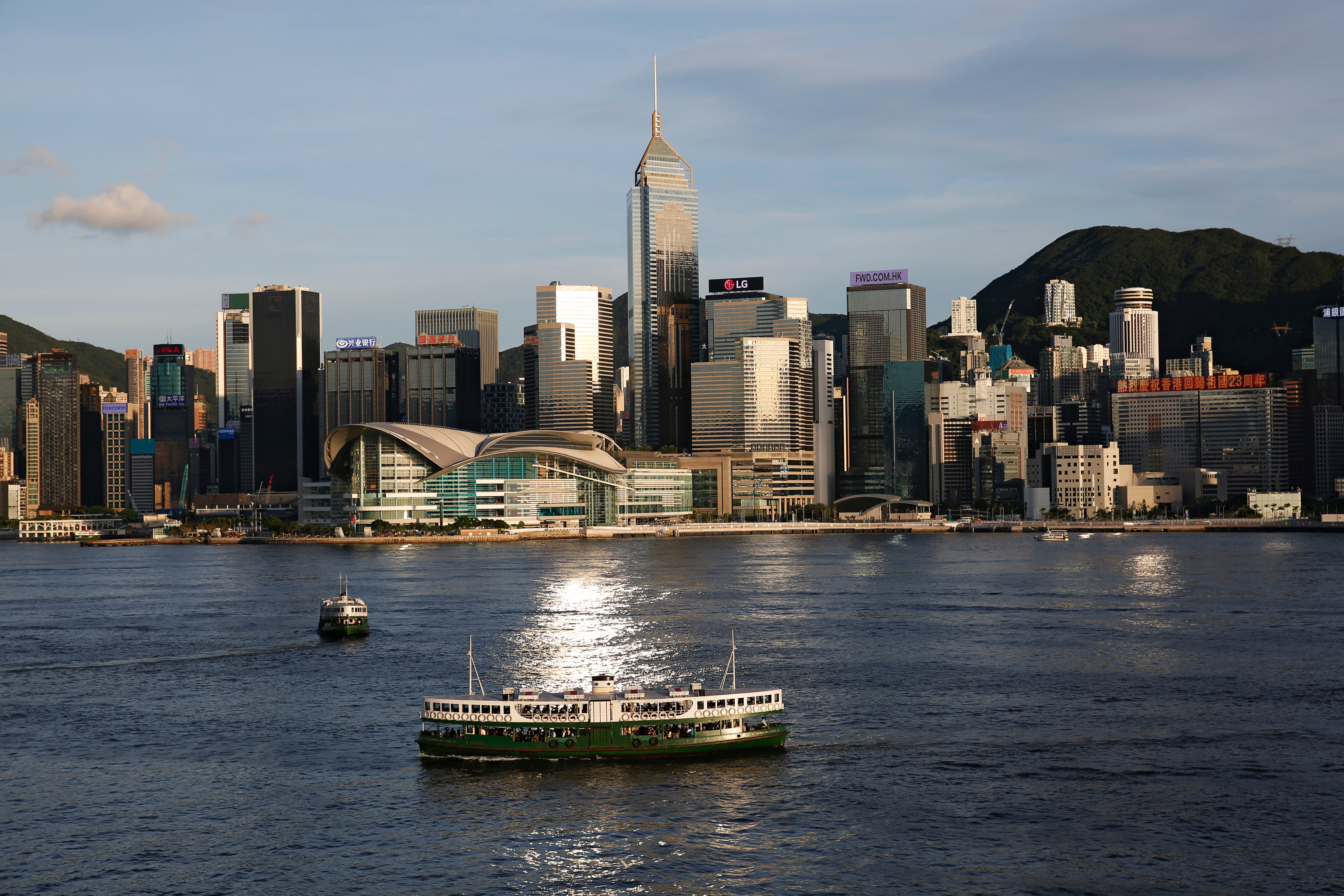 A Star Ferry boat crosses Victoria Harbour in front of a skyline of buildings in Hong Kong on June 29, 2020. Photo: Reuters