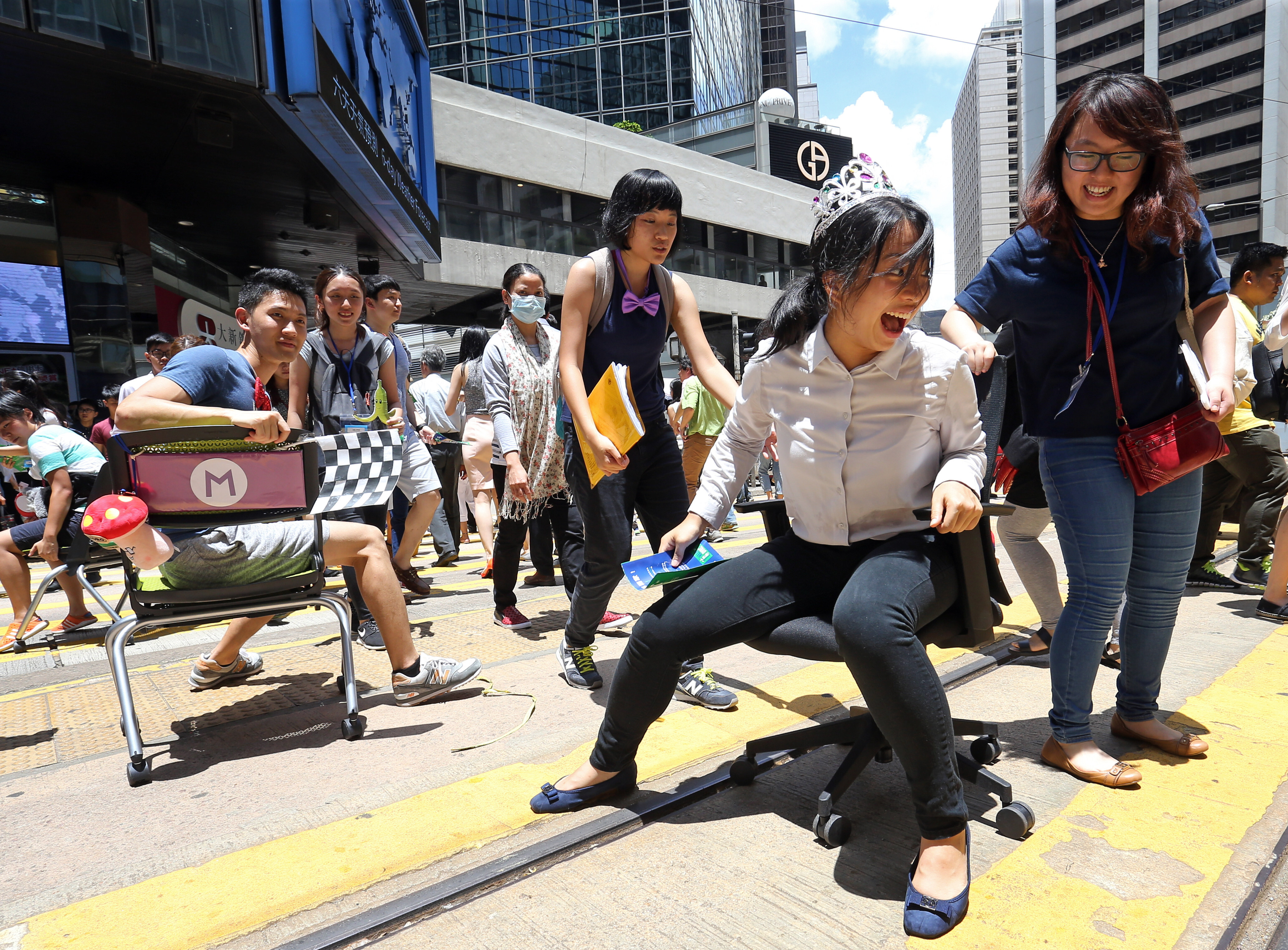 Campaigners from a non-profit group take part in an event in Hong Kong’s Central district in June 2016, to raise awareness of air pollution and call for pedestrianisation. Photo: Dickson Lee