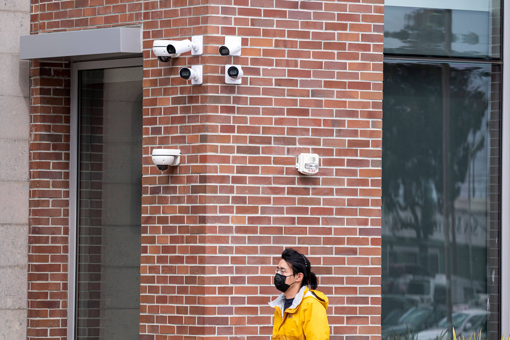 A pedestrian walks past Verkada Inc security cameras at the company’s headquarters in San Mateo, California, U.S., on March 10, 2021. Photo: Bloomberg