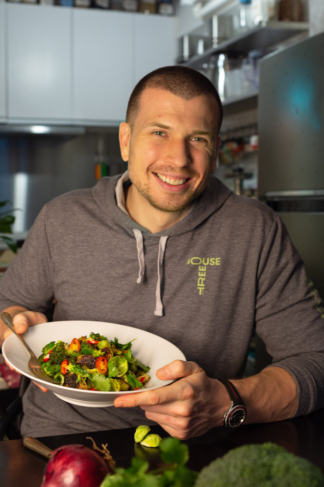 Mongendre with his flavour-packed broccoli and Brussels sprouts dish. Photo: Anthony Damico