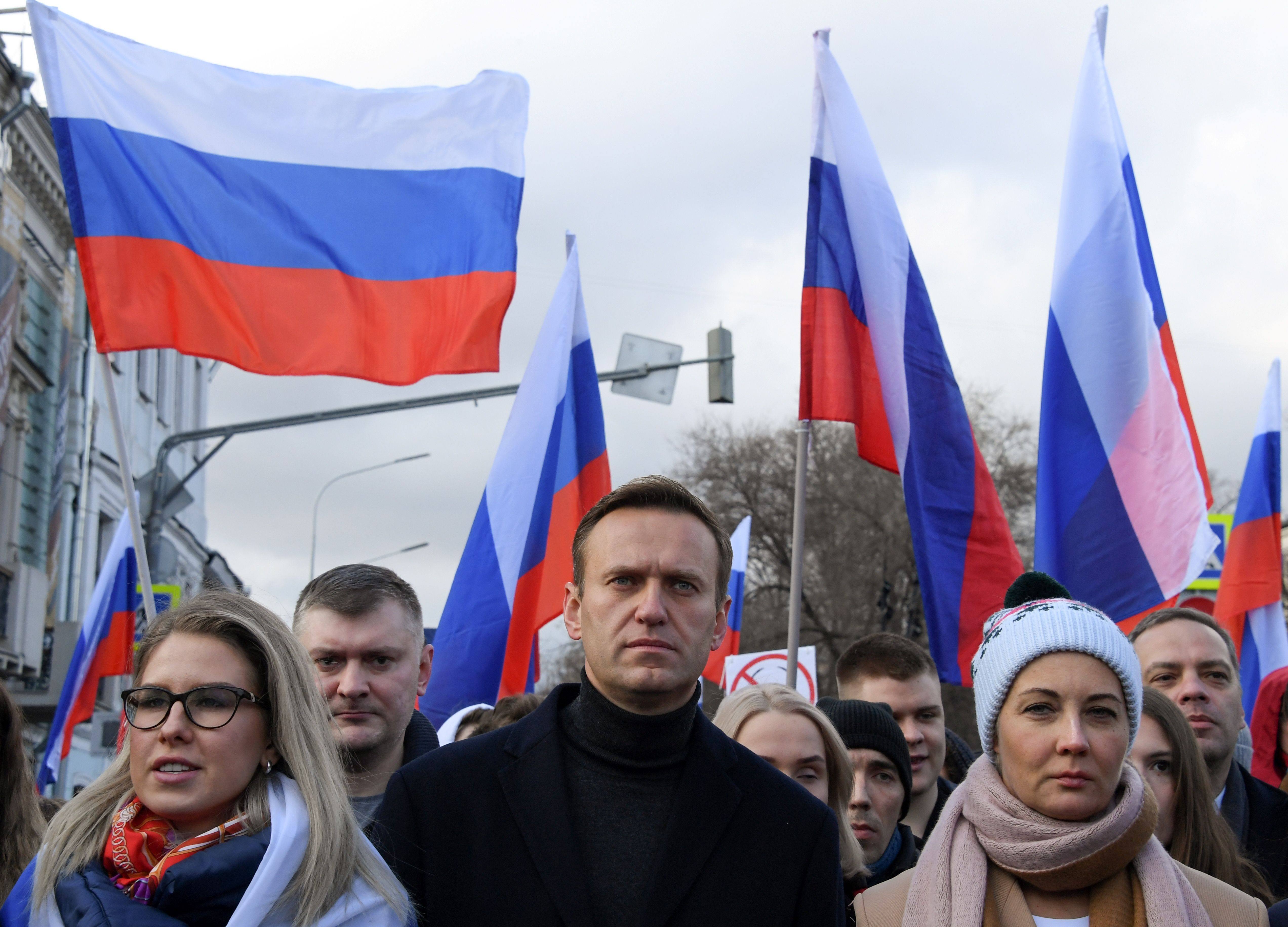 Russian opposition leader Alexei Navalny (centre) marches in Moscow on February 29, 2020. Bellingcat was part of a joint investigation into Navalny’s poisoning. Photo: AFP