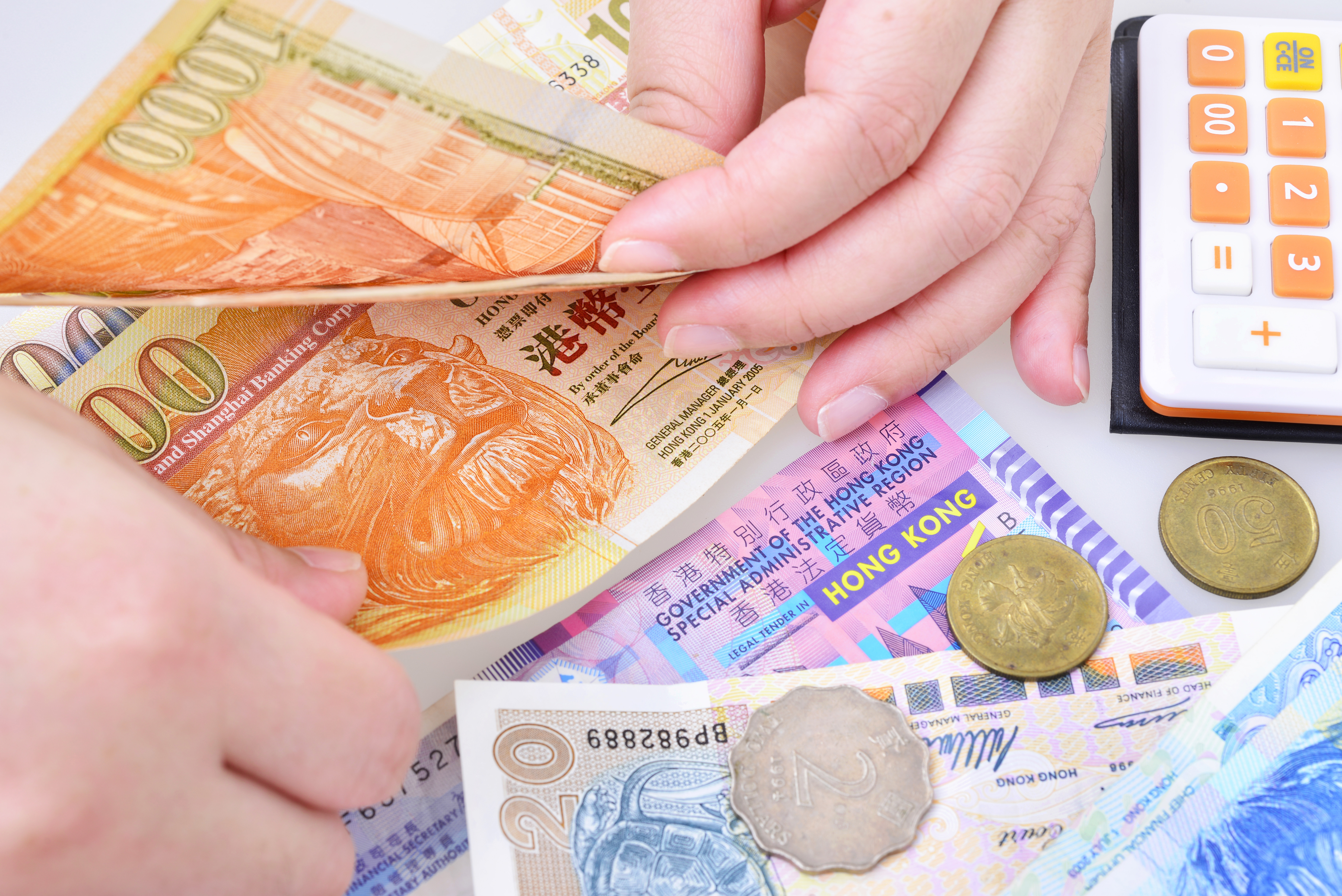 Hong Kong’s currency weakened to a one-year-low of about 7.77 per US dollar on March 8 as local stocks slumped from February’s peak. Photo: Shutterstock
