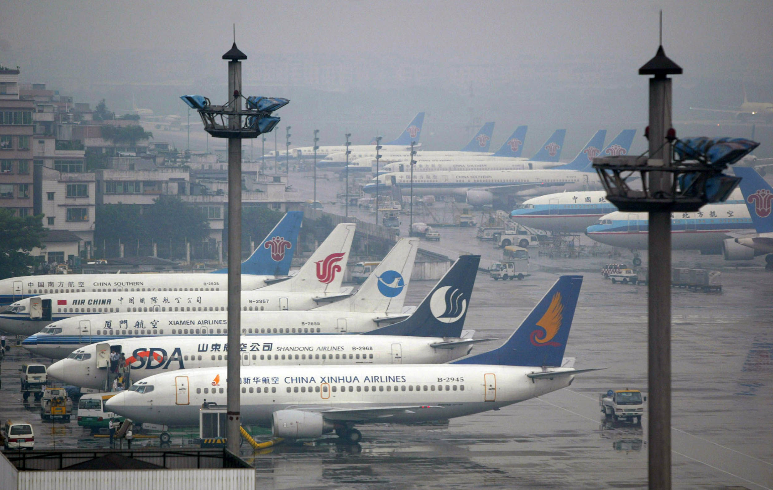 Passenger jets are parked at the Baiyun International Airport in Guangzhou. Photo: Reuters