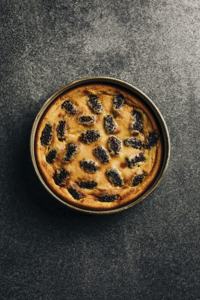 Mulberry clafoutis. Photo: Adam Gibson/Hardie Grant Books via AP