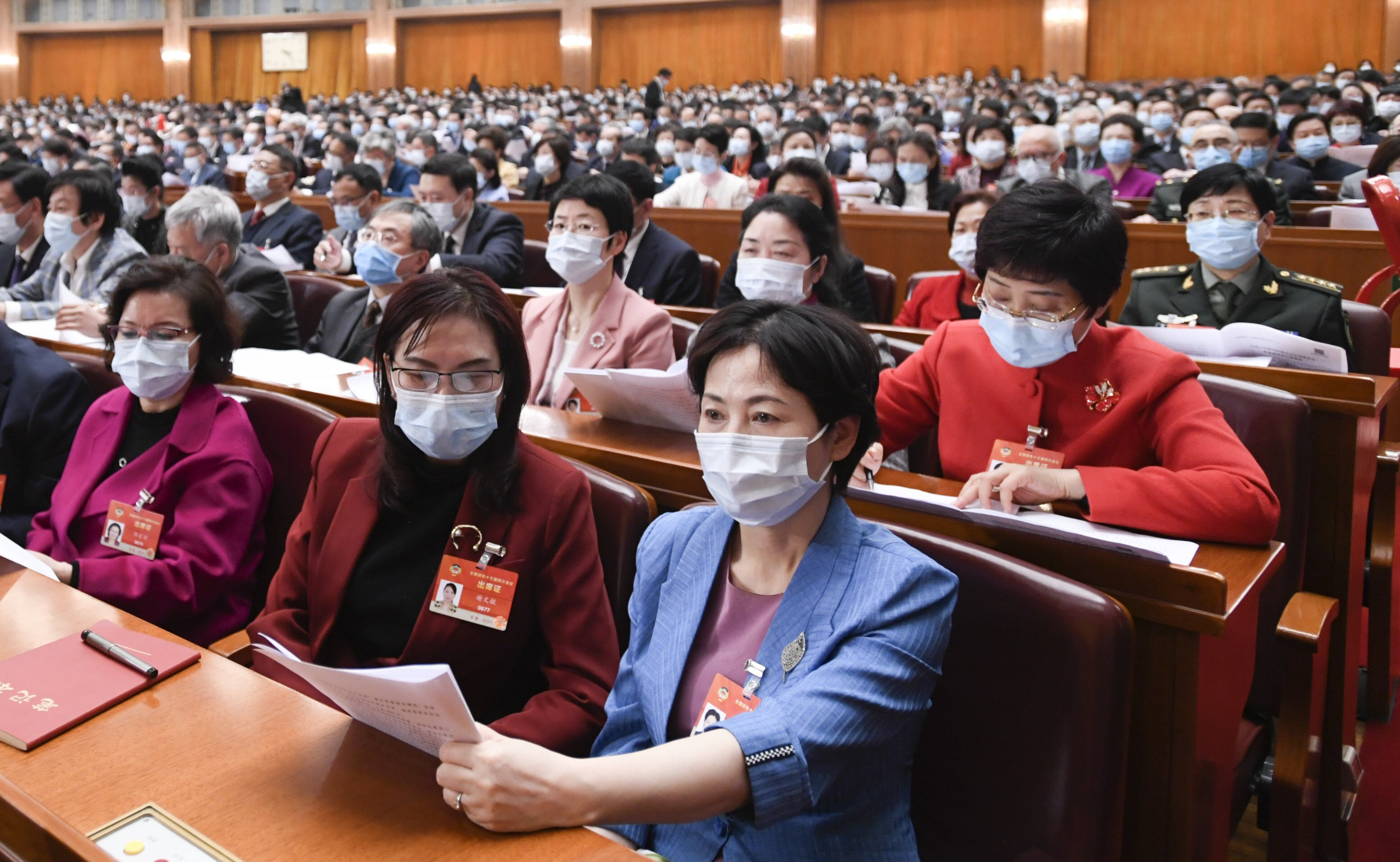 Women attend a meeting of the 13th CPPCC National Committee at the Great Hall of the People in Beijing on March 4. Photo: Xinhua
