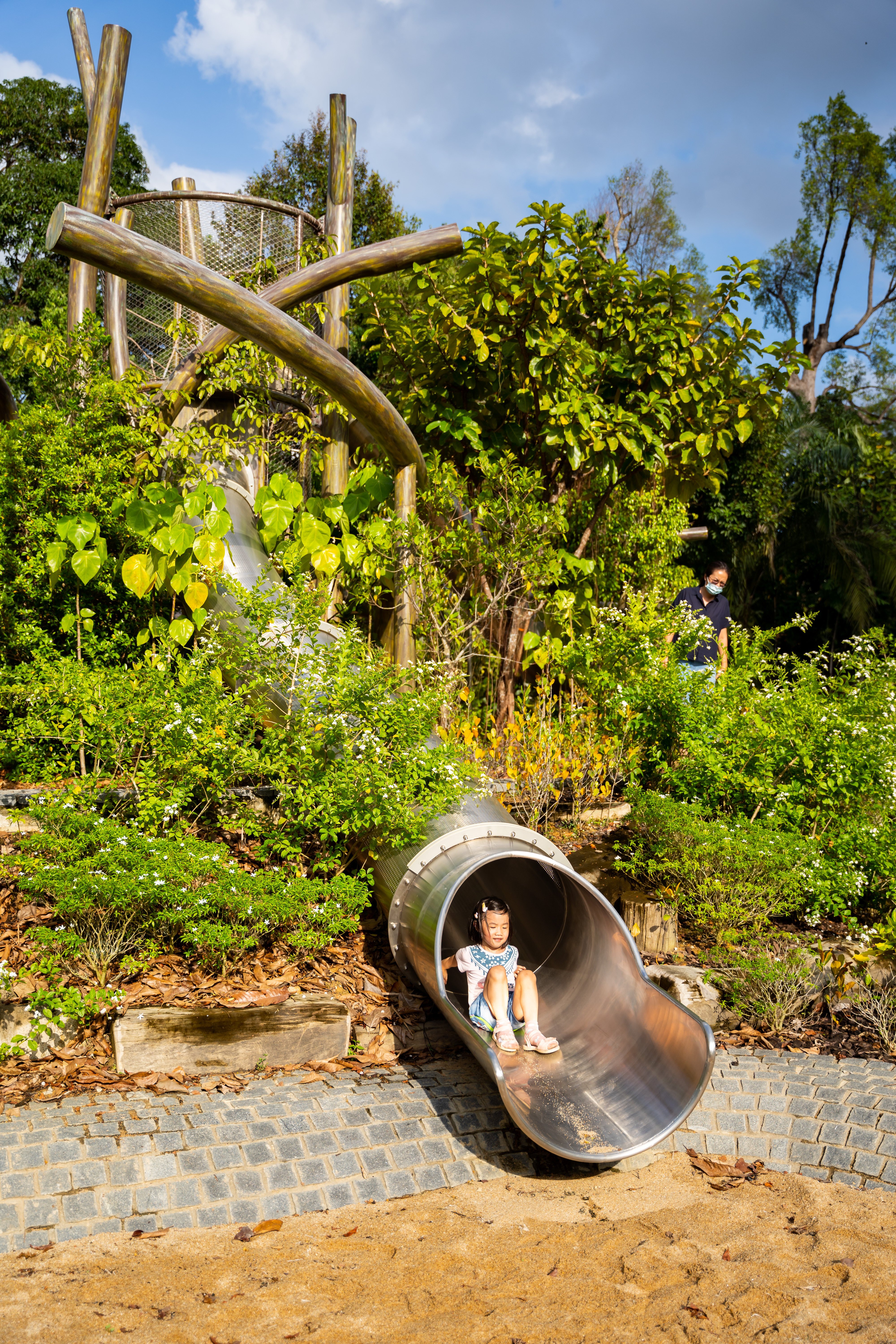 A  child plays on a slide the Como Adventure Grove, at the Singapore Botanic Gardens.&#xA;&#xA;CREDIT: National Parks Board, Singapore