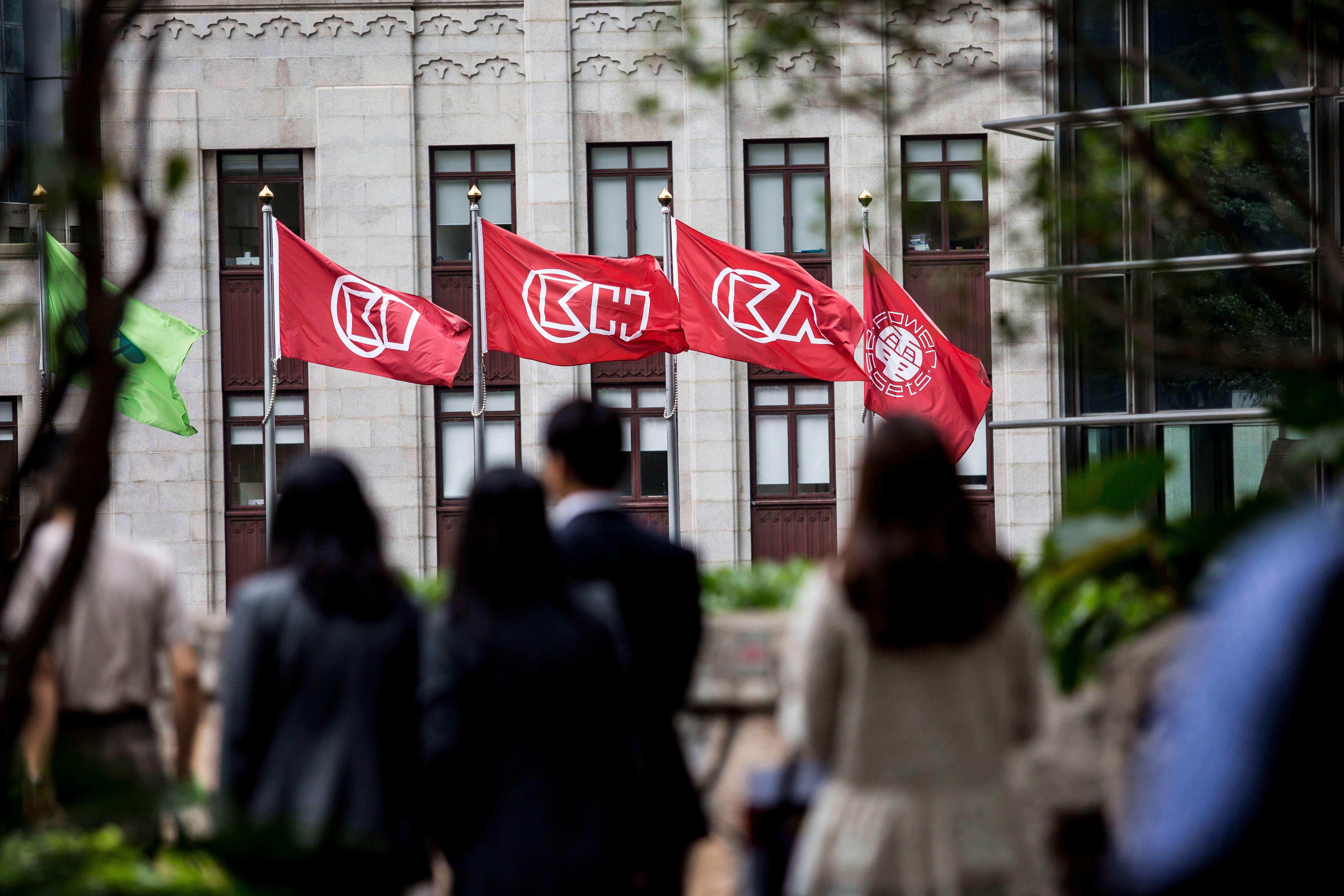 CK Hutchison Holdings flags are displayed outside the company’s headquarters in Hong Kong. Photo: AFP