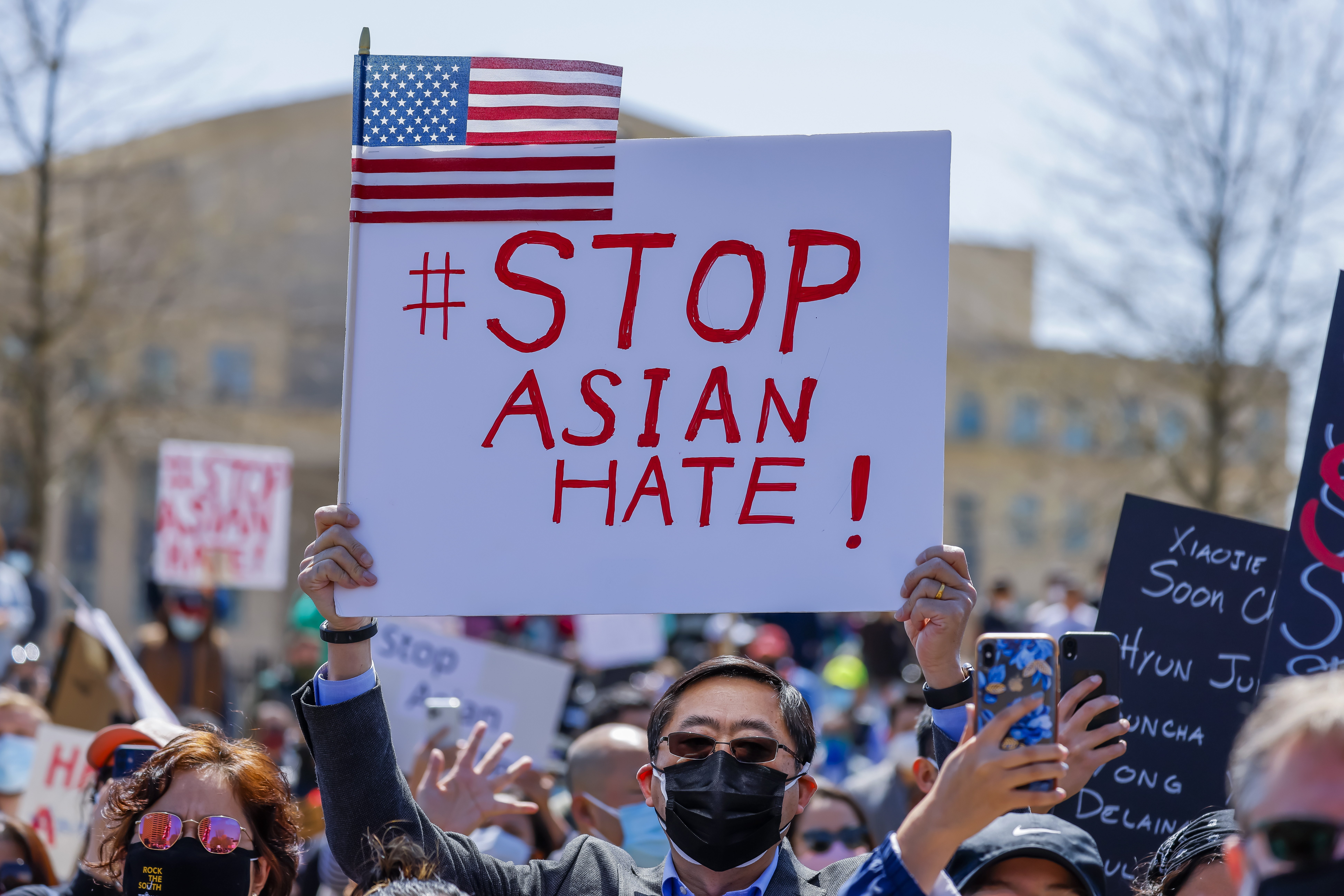 People participate in a march against Asian-American and Pacific Islander racism and violence, outside the State Capitol in downtown Atlanta, Georgia, on March 20. Photo: EPA-EFE