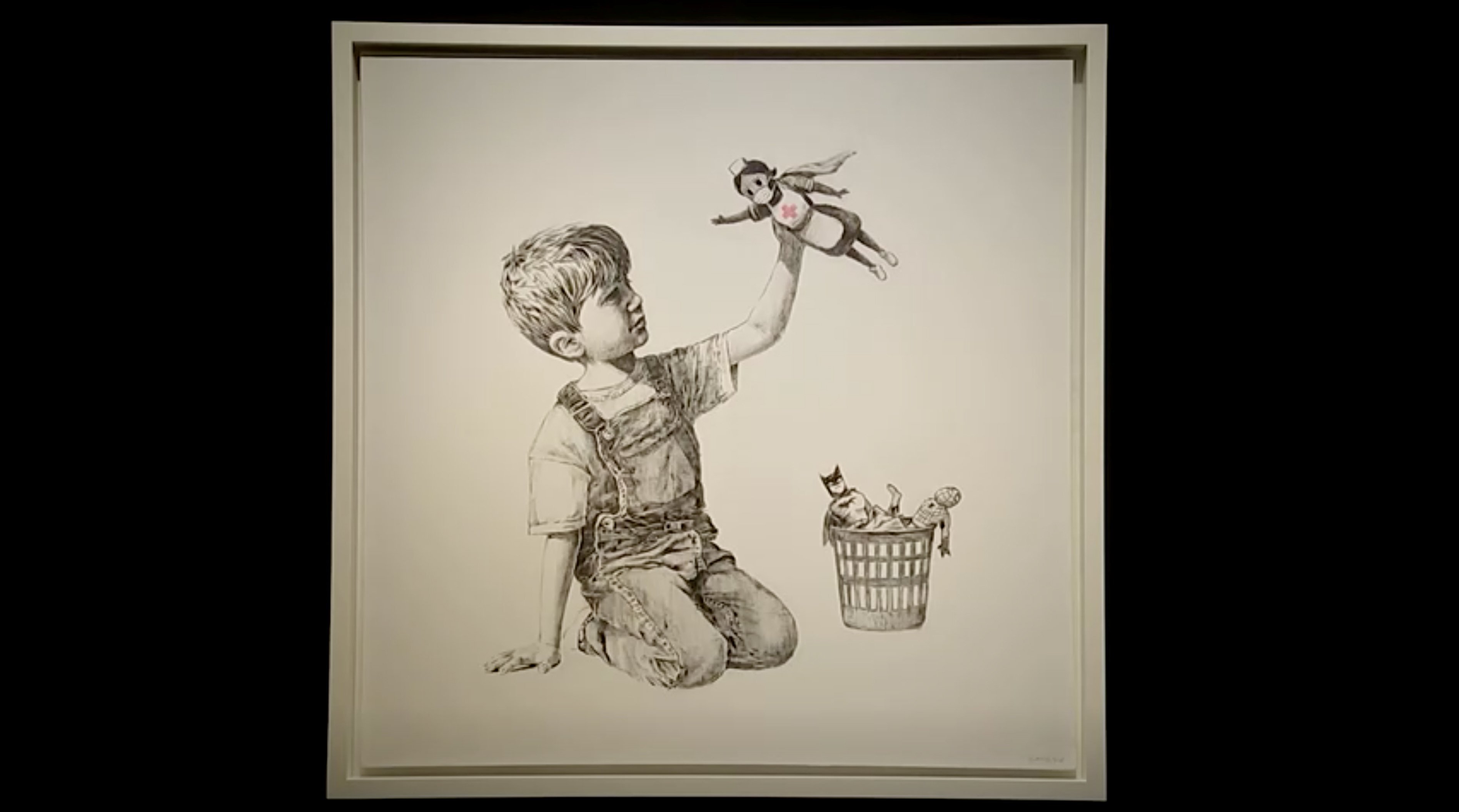 Banksy’s ‘Game Changer’ is seen on display at Christies London. Photo: Reuters