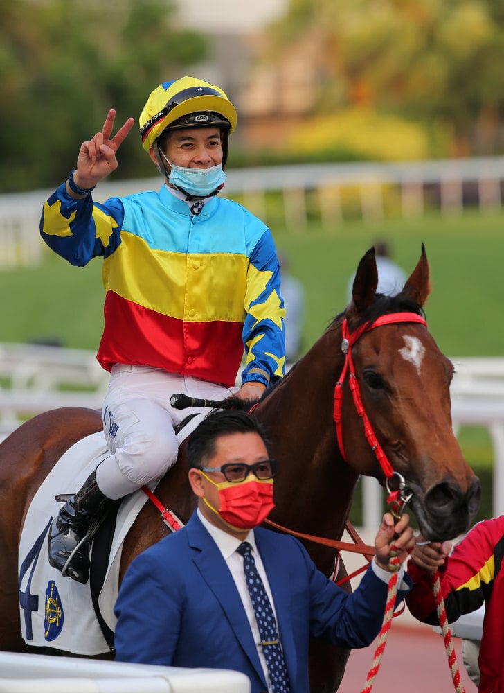 Derek Leung celebrates his victory aboard Good View Clarico.