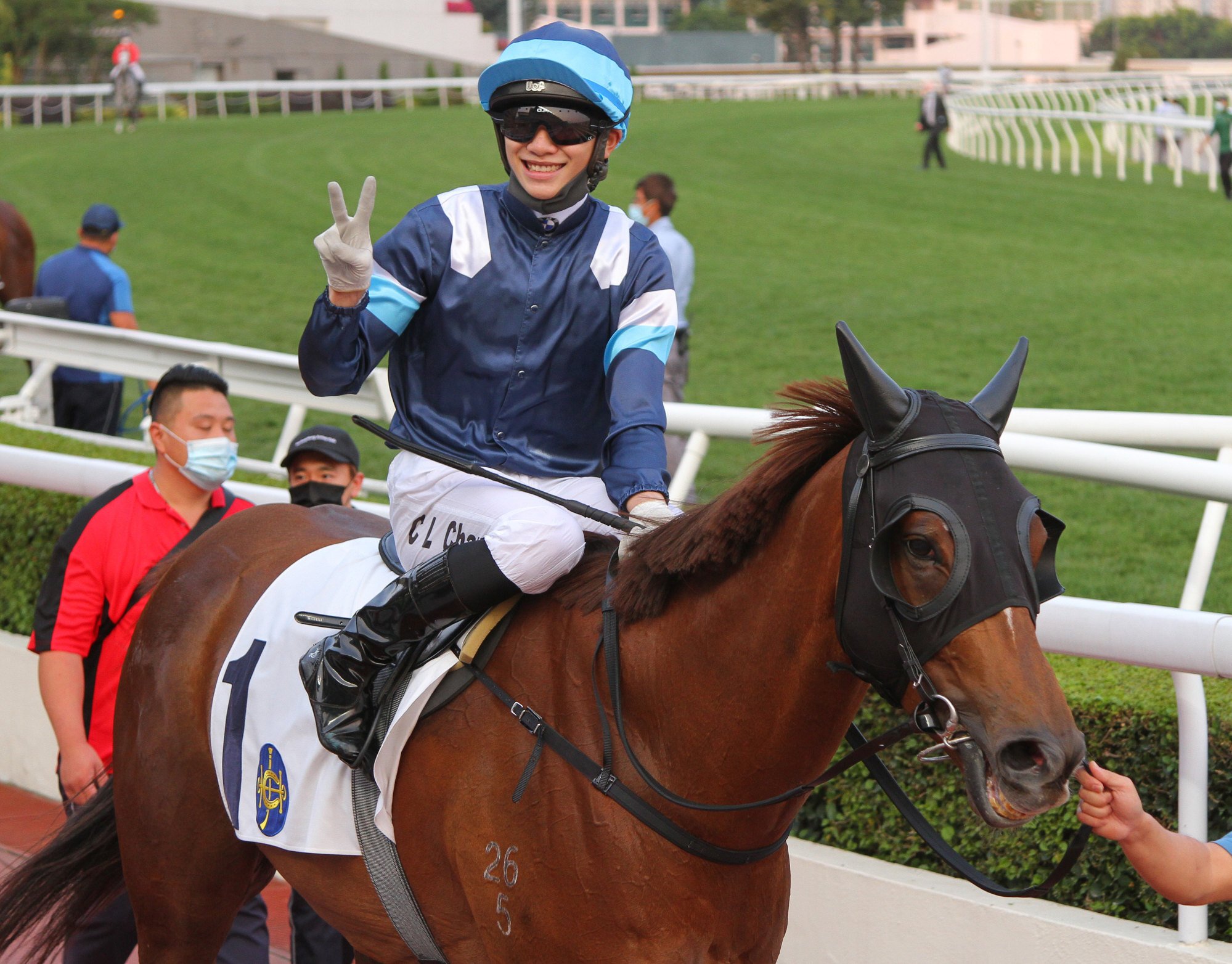 Jerry Chau returns aboard Duke Wai after bagging a double at Sha Tin on Sunday. 