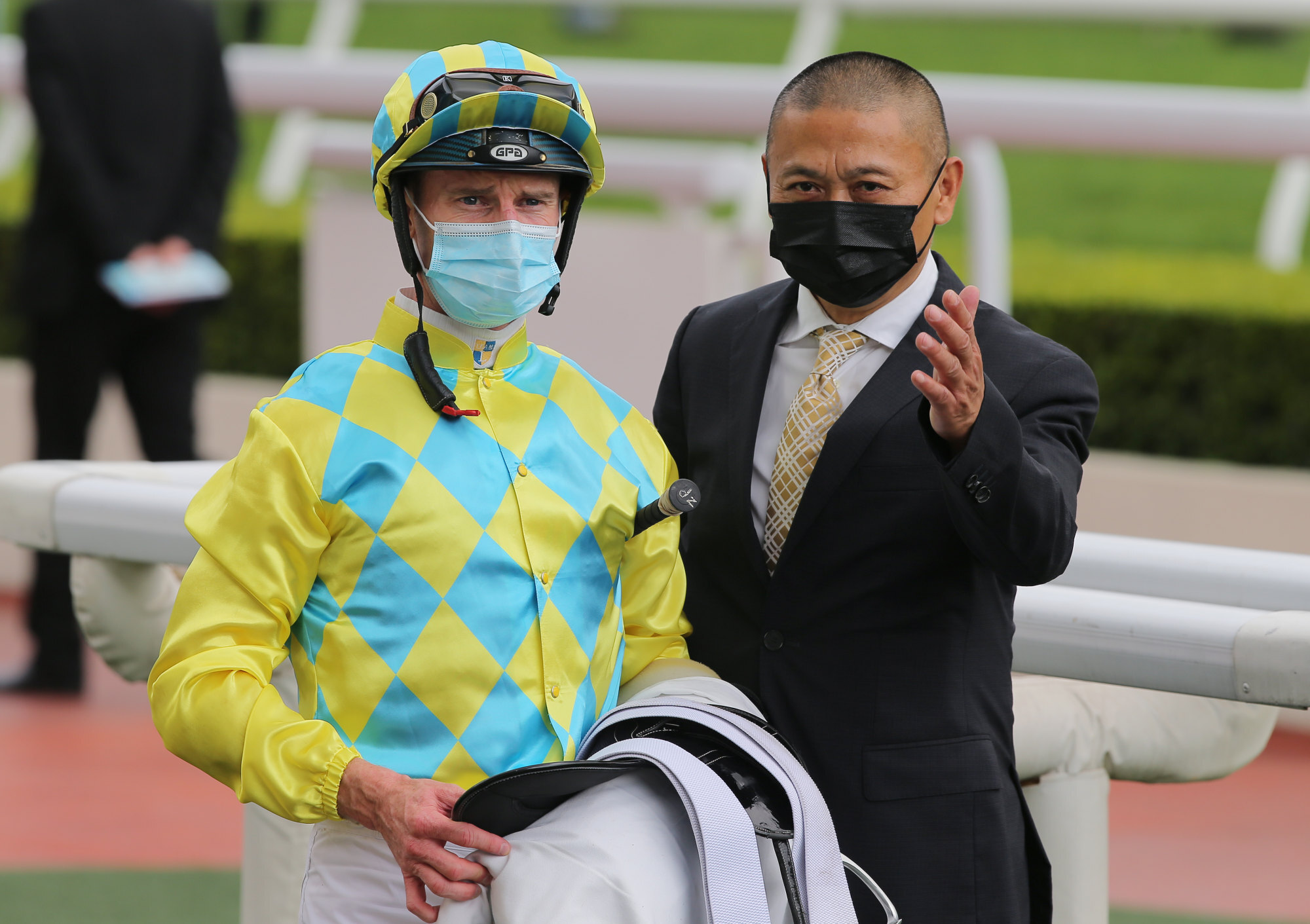 Zac Purton and Danny Shum celebrate Winner Method’s victory.