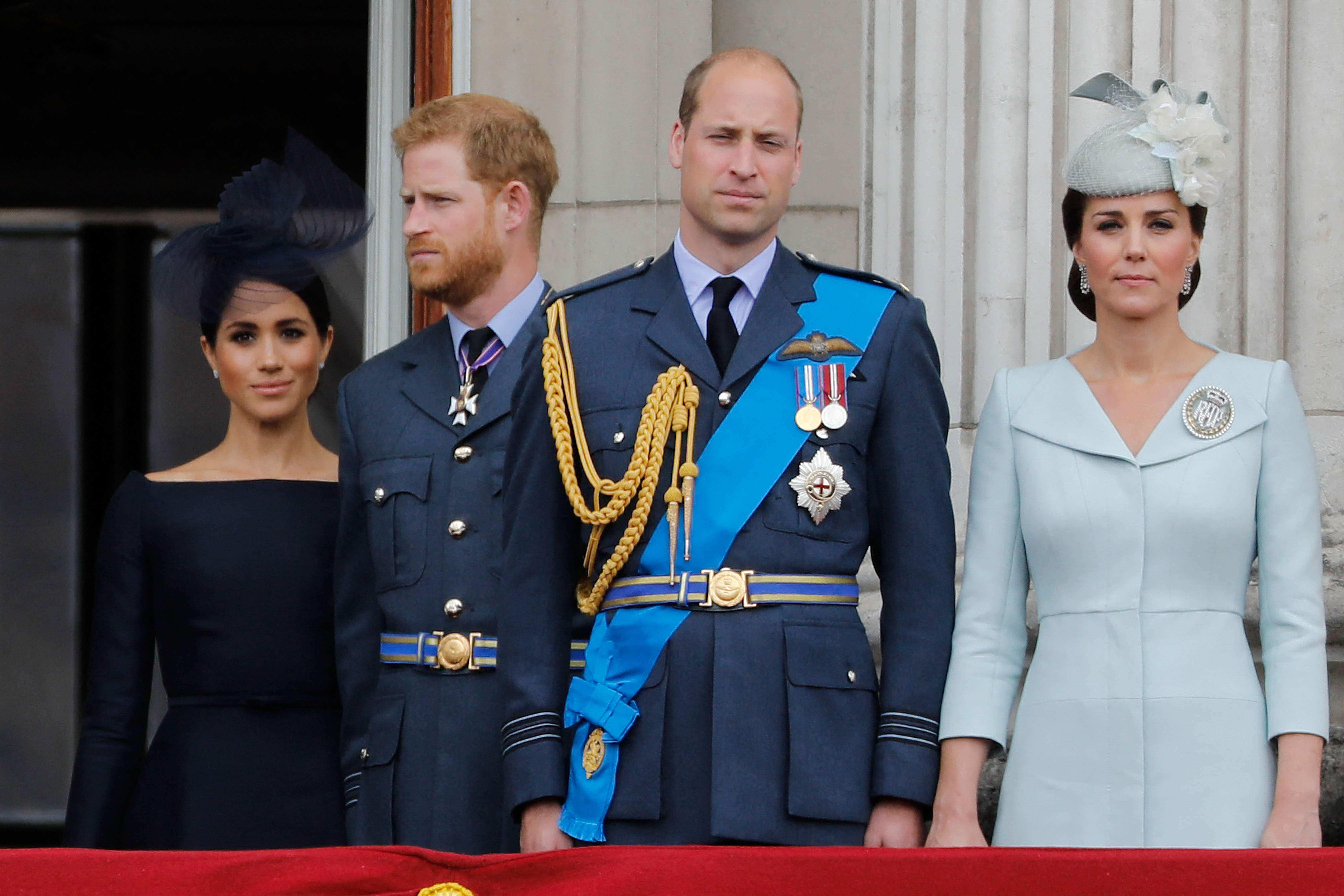 In this file photo taken on July 10, 2018 (L-R) Britains Meghan, Duchess of Sussex, Britains Prince Harry, Duke of Sussex, Britains Prince William, Duke of Cambridge and Britains Catherine, Duchess of Cambridge, stand on the balcony of Buckingham Palace on July 10, 2018 to watch a military fly-past to mark the centenary of the Royal Air Force (RAF). Photo:Tolga AKMEN / AFP