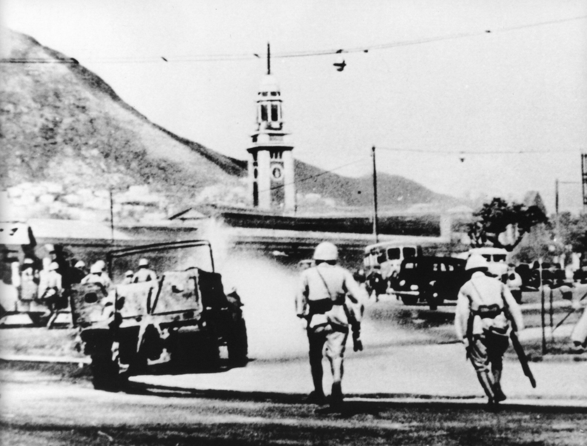 Japanese soldiers launch an attack on the Kowloon-Canton Railway terminus on December 12, 1941, during World War II. The only time the tower’s four clocks stopped working was during the Japanese occupation of Hong Kong. Photo: The Kowloon-Canton Railway Corporation (KCRC)