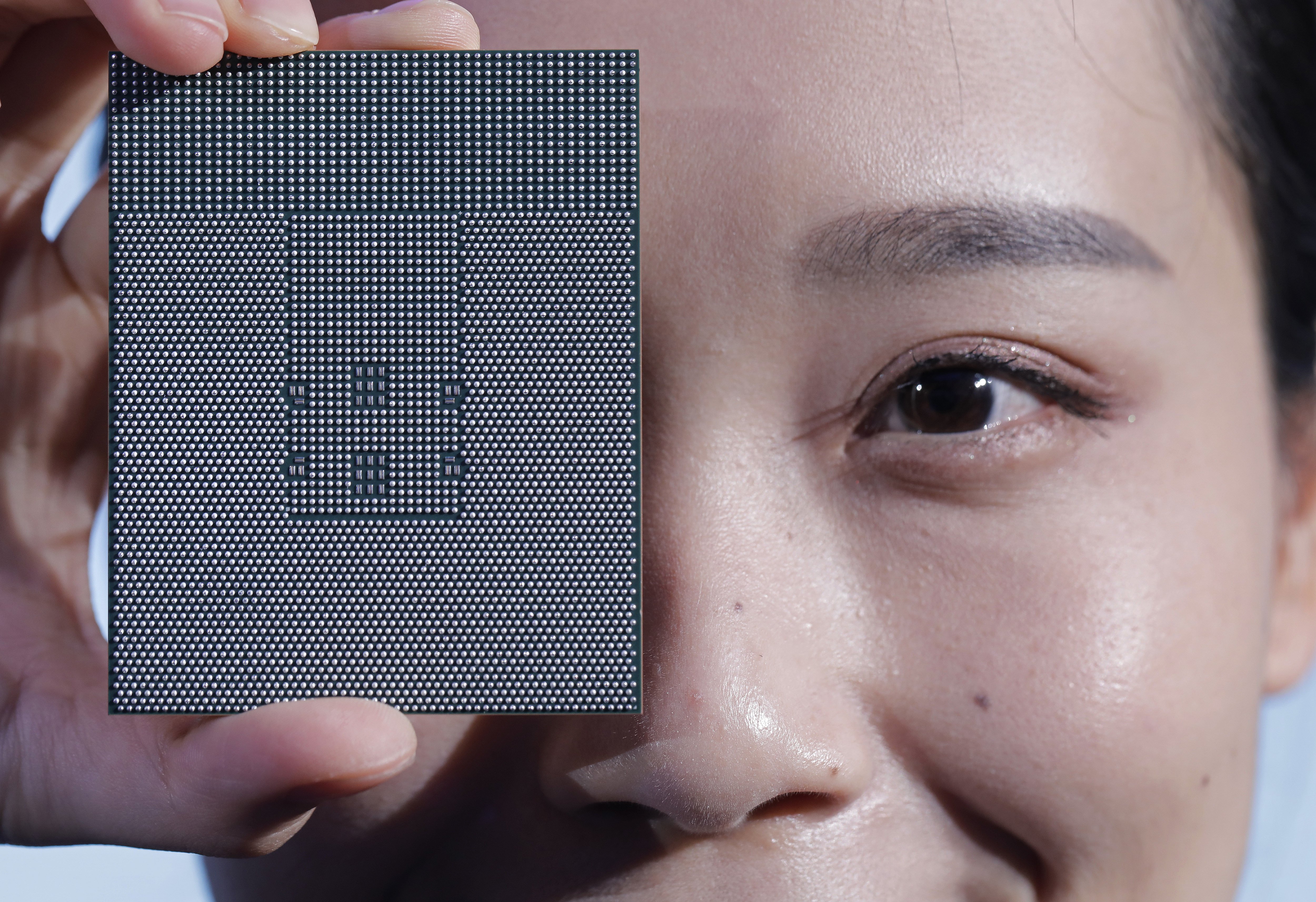 A Kunpeng 920 chip is unveiled by Chinese telecom giant Huawei during a ceremony in Shenzhen. China is prioritising the development of its semiconductor sector as the US restricts exports of technology. Photo: AP