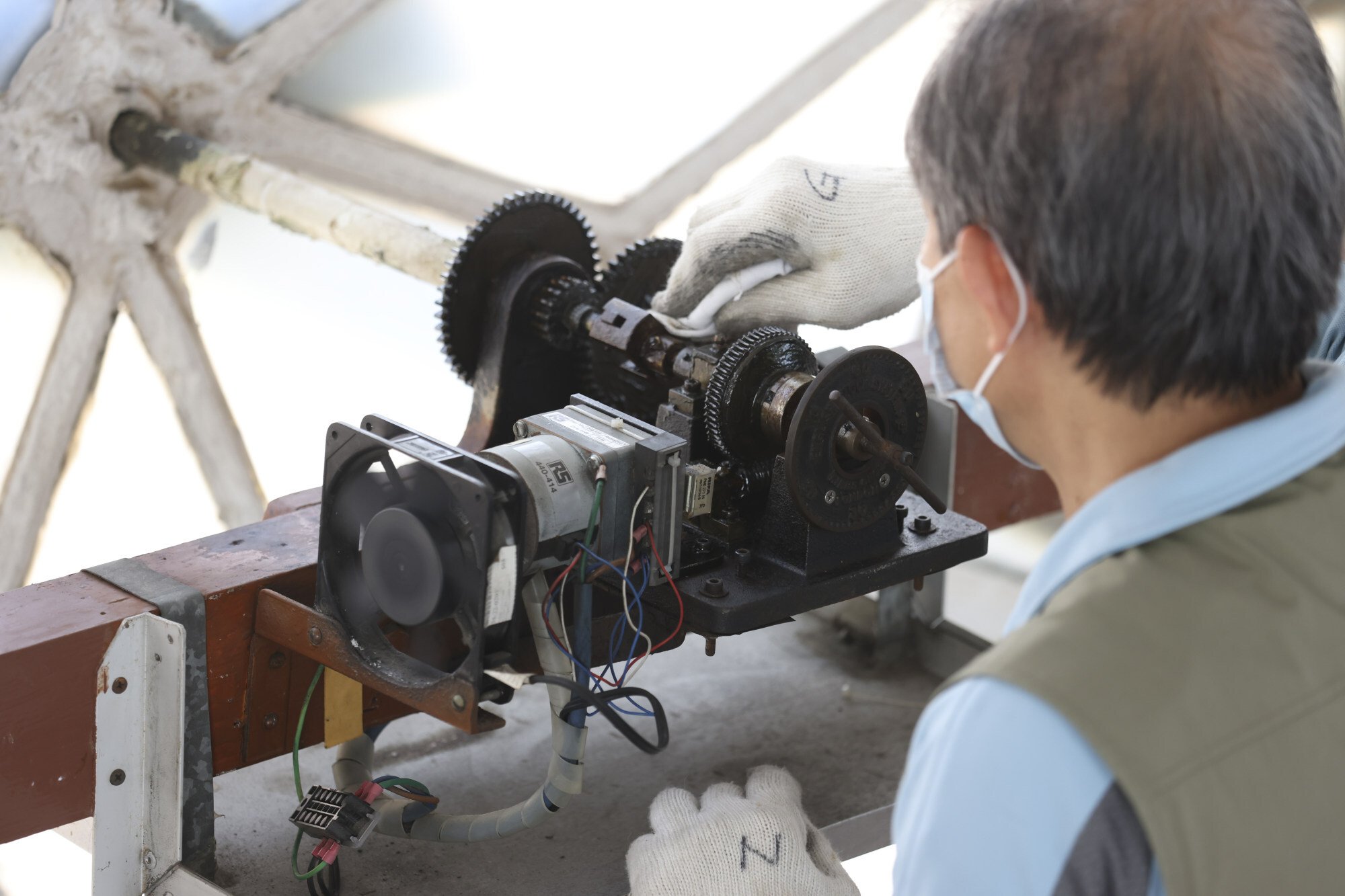 A technician carries out maintenance work on one of the four clocks inside the Clock Tower in Tsim Sha Tsui. Photo: Nora Tam
