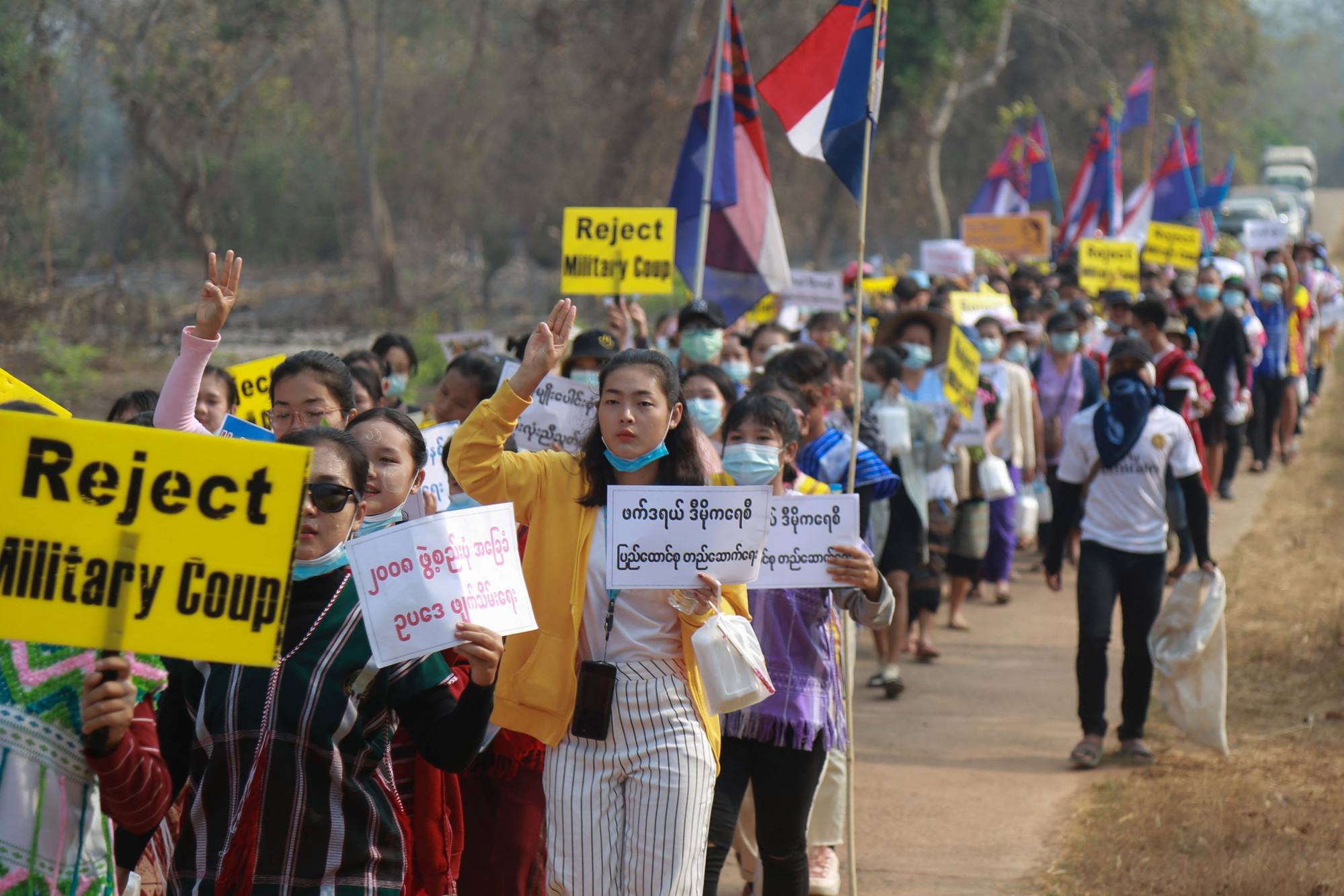 People march in an anti-military coup protest in Hlaingbwe township, Karen state, in eastern Myanmar. Photo: Karen Information Center/AFP