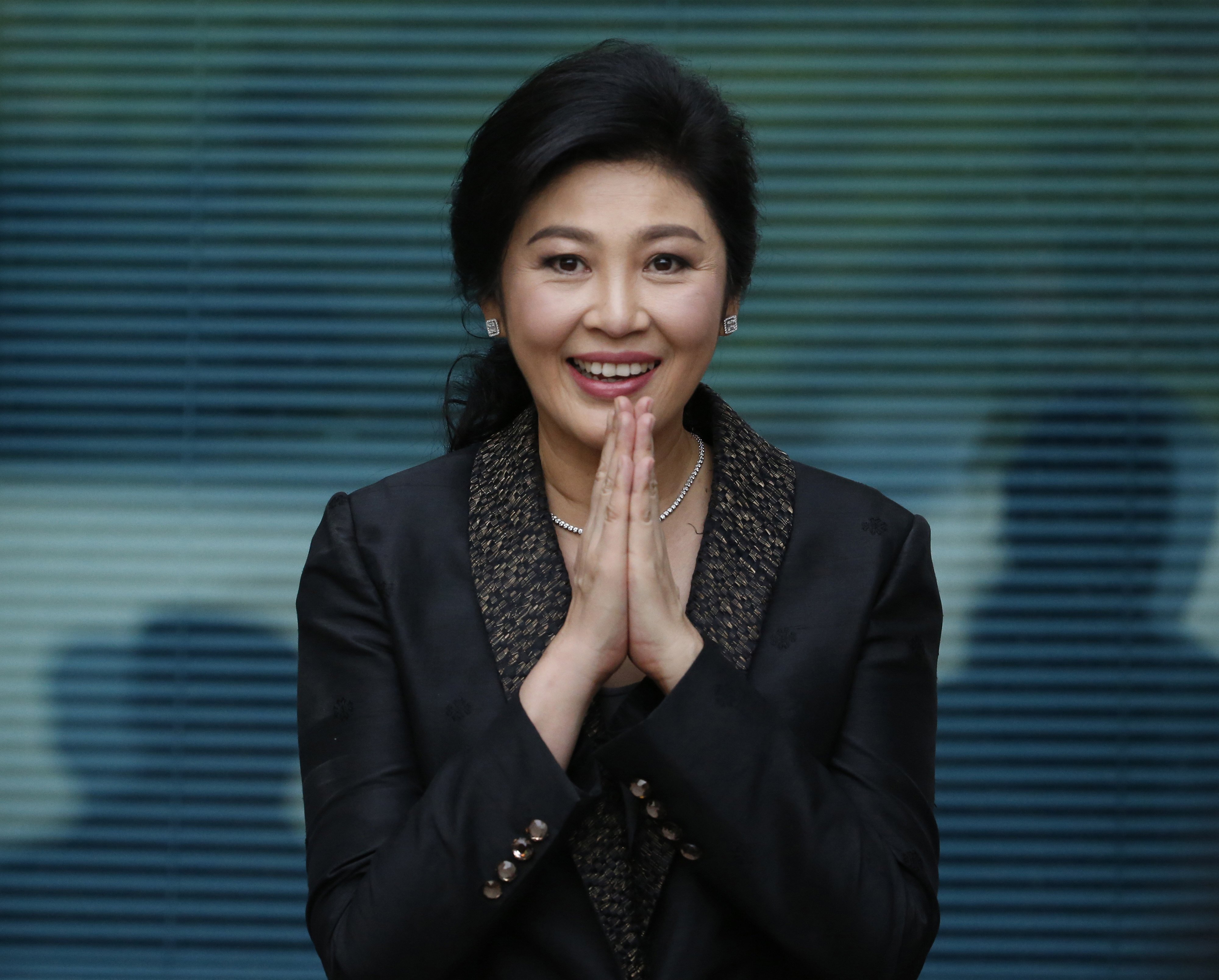 Former Thai prime minister Yingluck Shinawatra arrives at the Supreme Court in Bangkok in August 2017 to make her final statements in a trial on a charge of criminal negligence. Photo: AP
